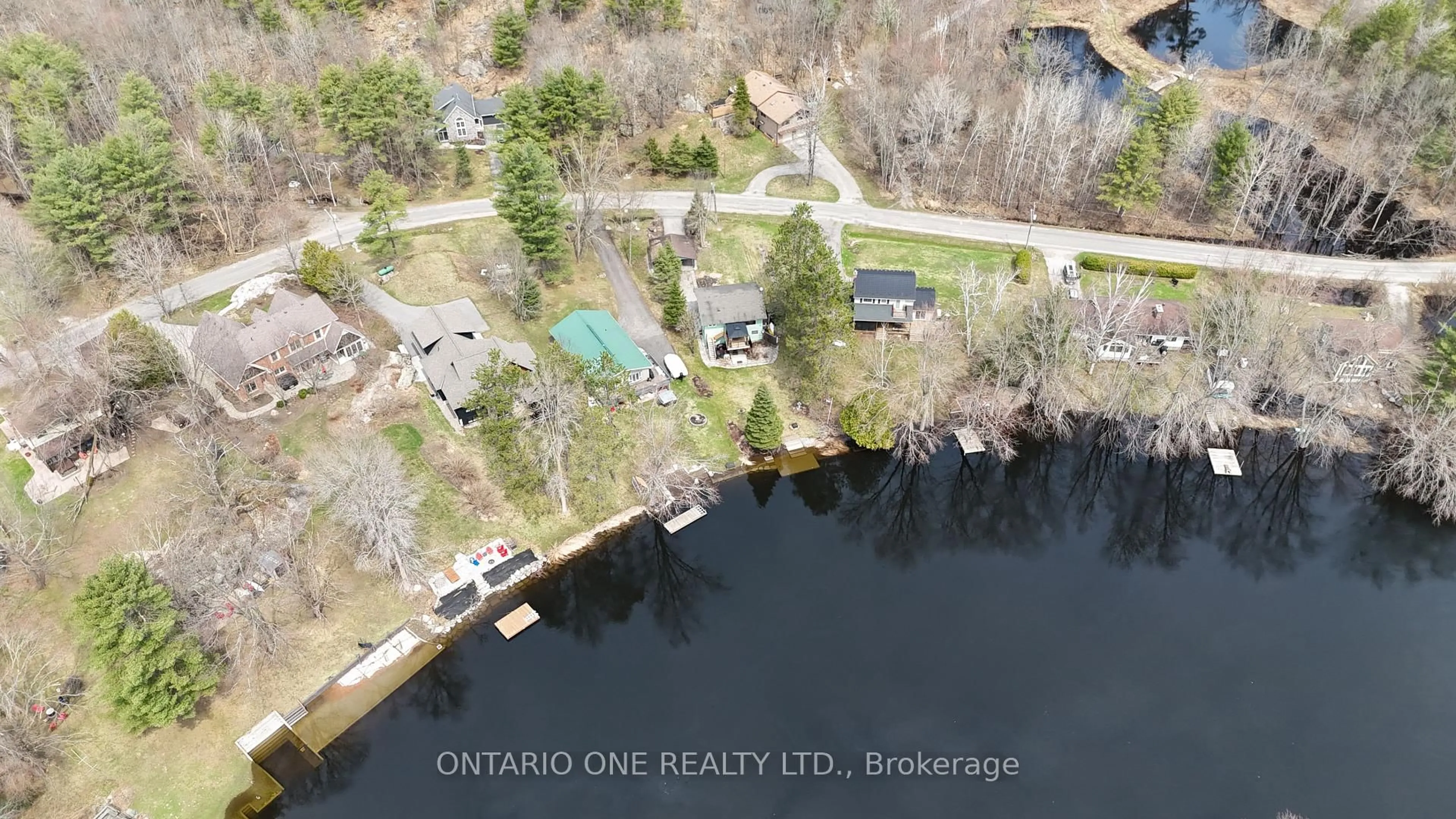 A pic from outside/outdoor area/front of a property/back of a property/a pic from drone, water/lake/river/ocean view for 1045 Cowbell Lane, Gravenhurst Ontario P0E 1N0