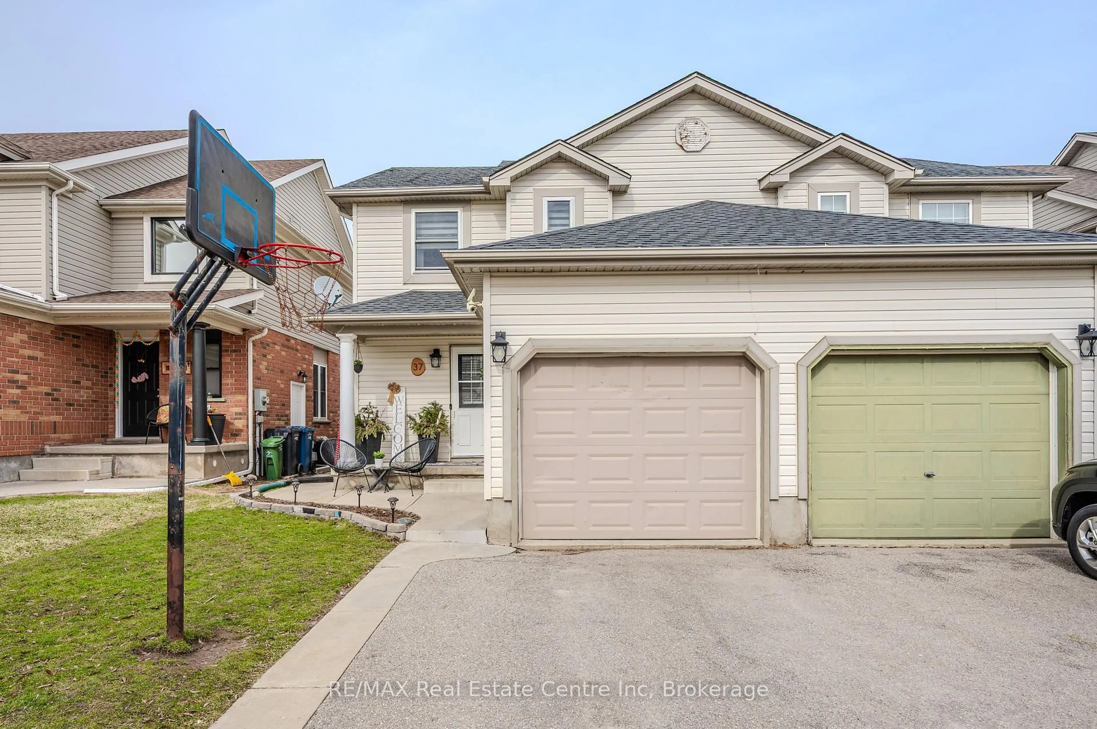 Home with brick exterior material, street for 37 Swift Cres, Guelph Ontario N1E 7J3