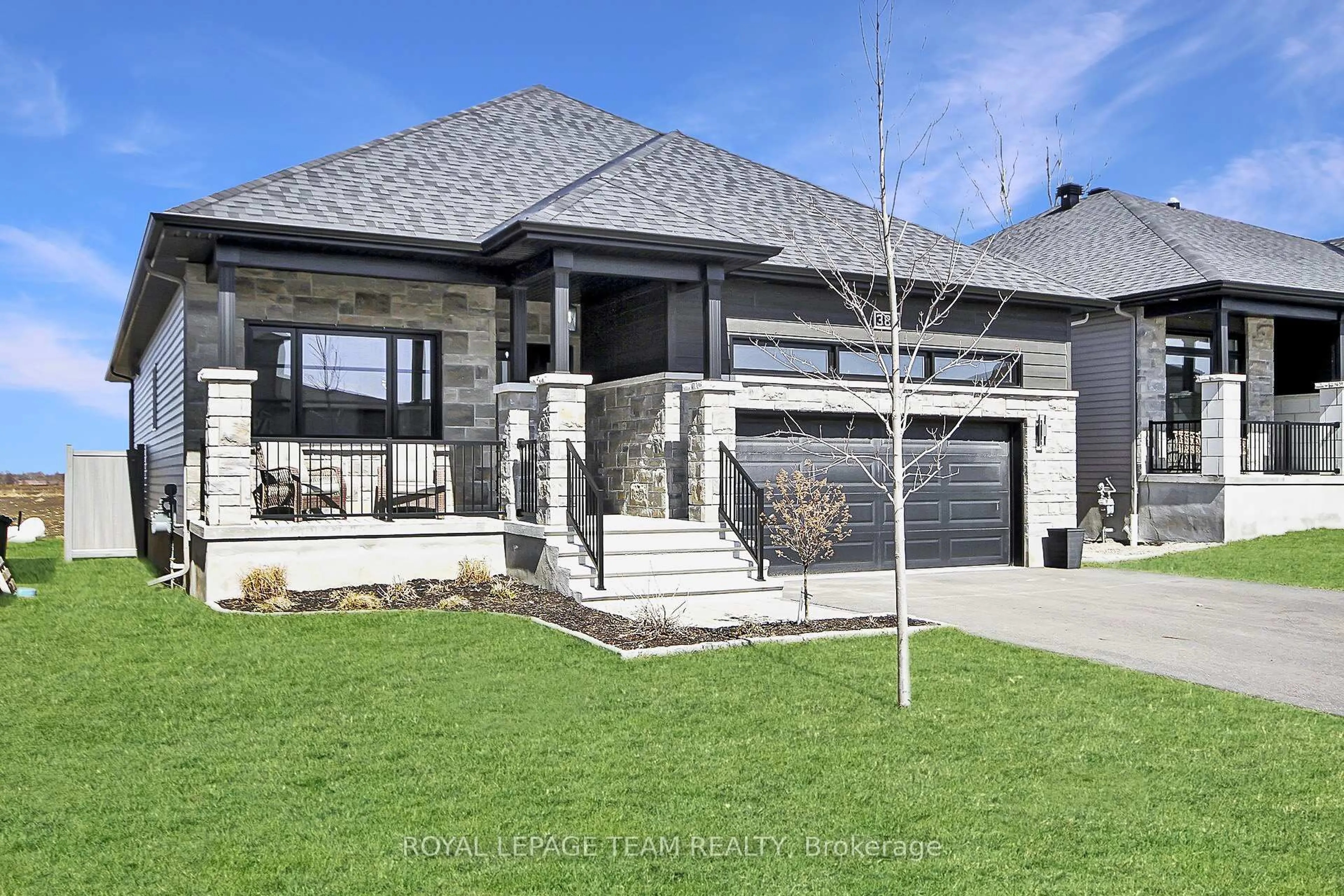 Home with brick exterior material, street for 389 Moonlight Dr, Russell Ontario K4R 0L2