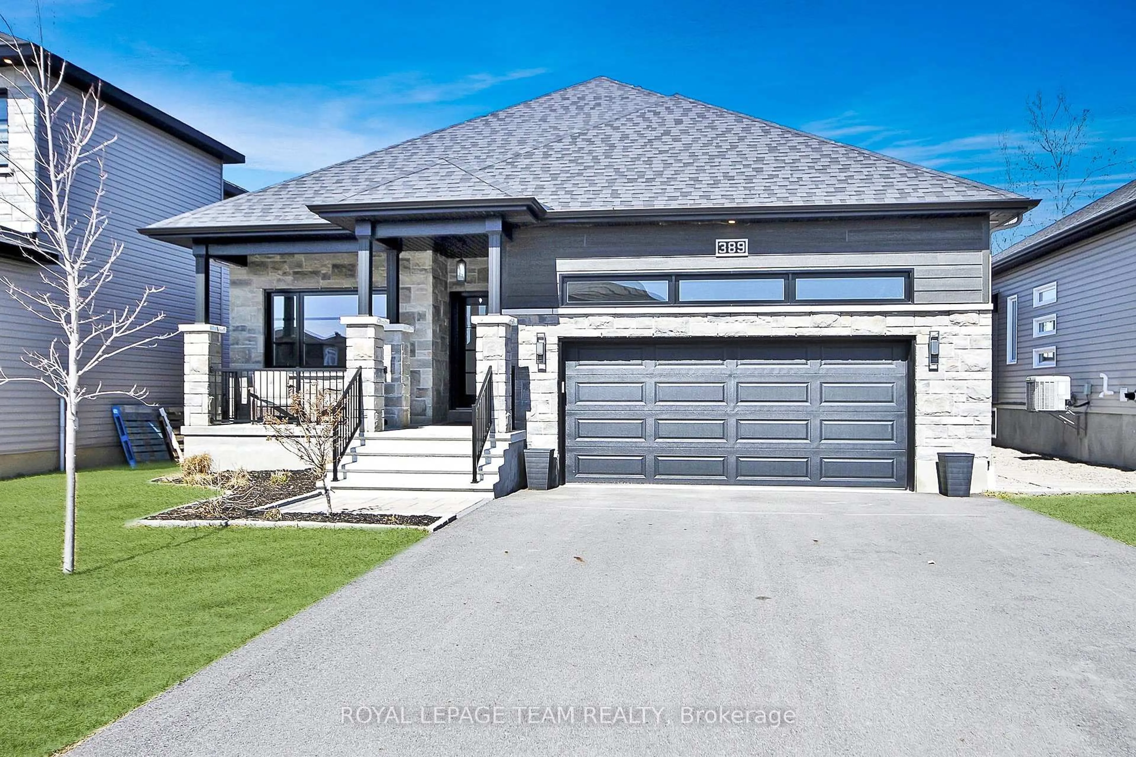 Home with brick exterior material, street for 389 Moonlight Dr, Russell Ontario K4R 0L2
