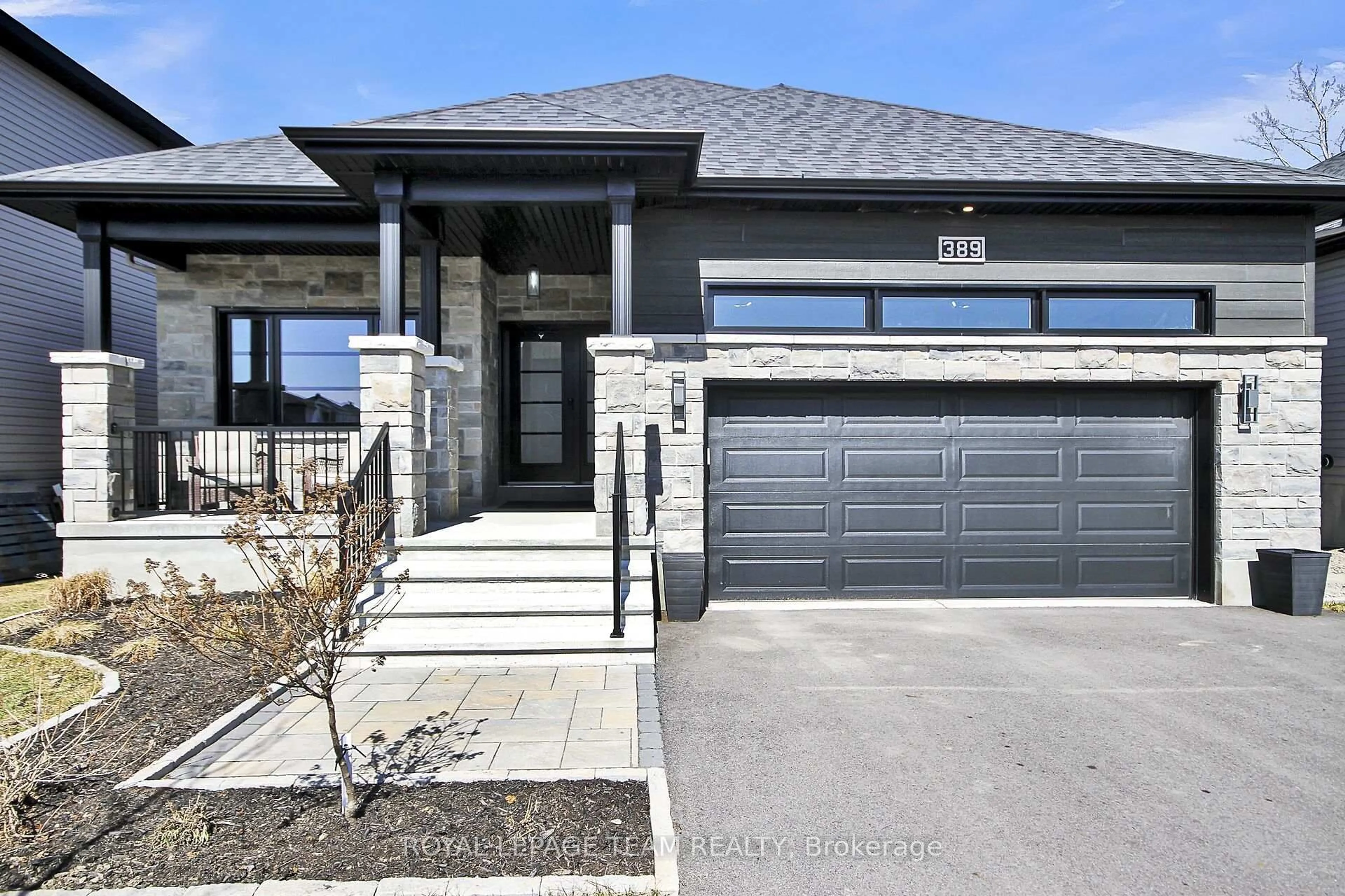 Home with brick exterior material, street for 389 Moonlight Dr, Russell Ontario K4R 0L2