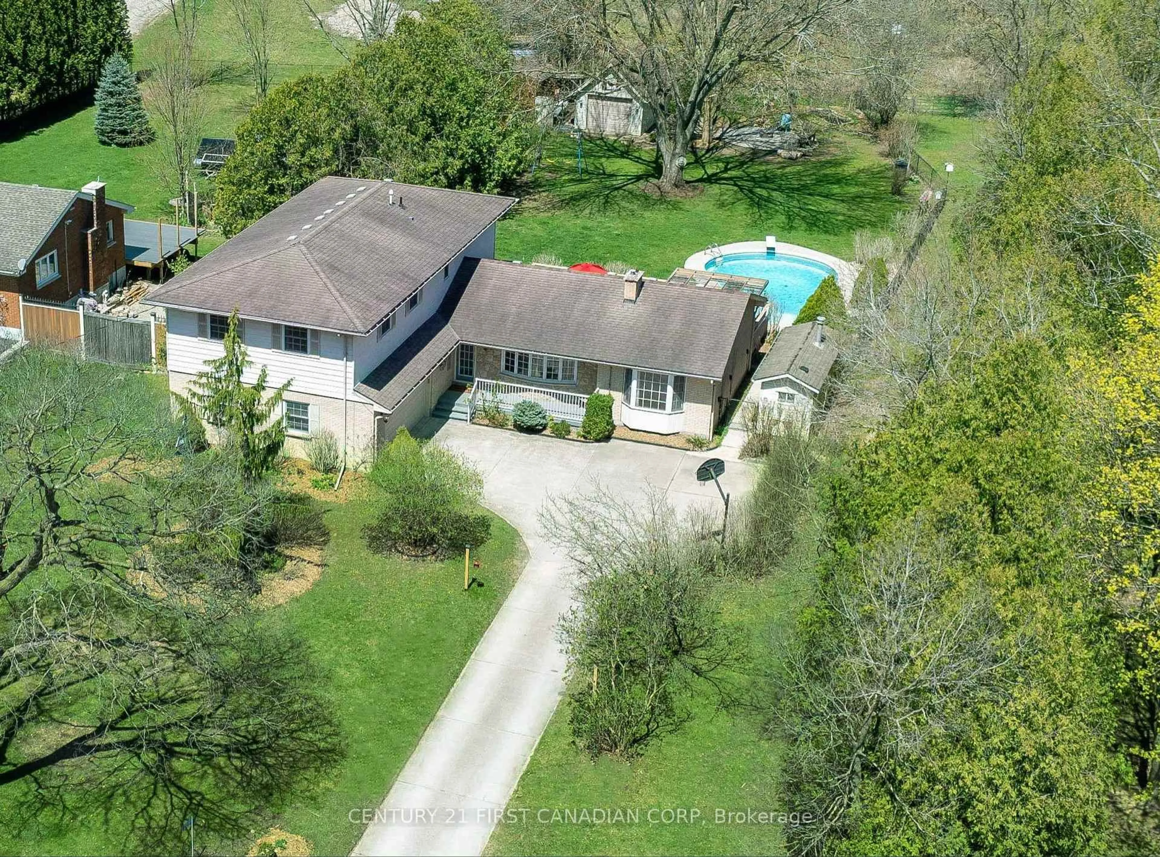 A pic from outside/outdoor area/front of a property/back of a property/a pic from drone, street for 21518 Adelaide Rd, Middlesex Centre Ontario N0L 1E0