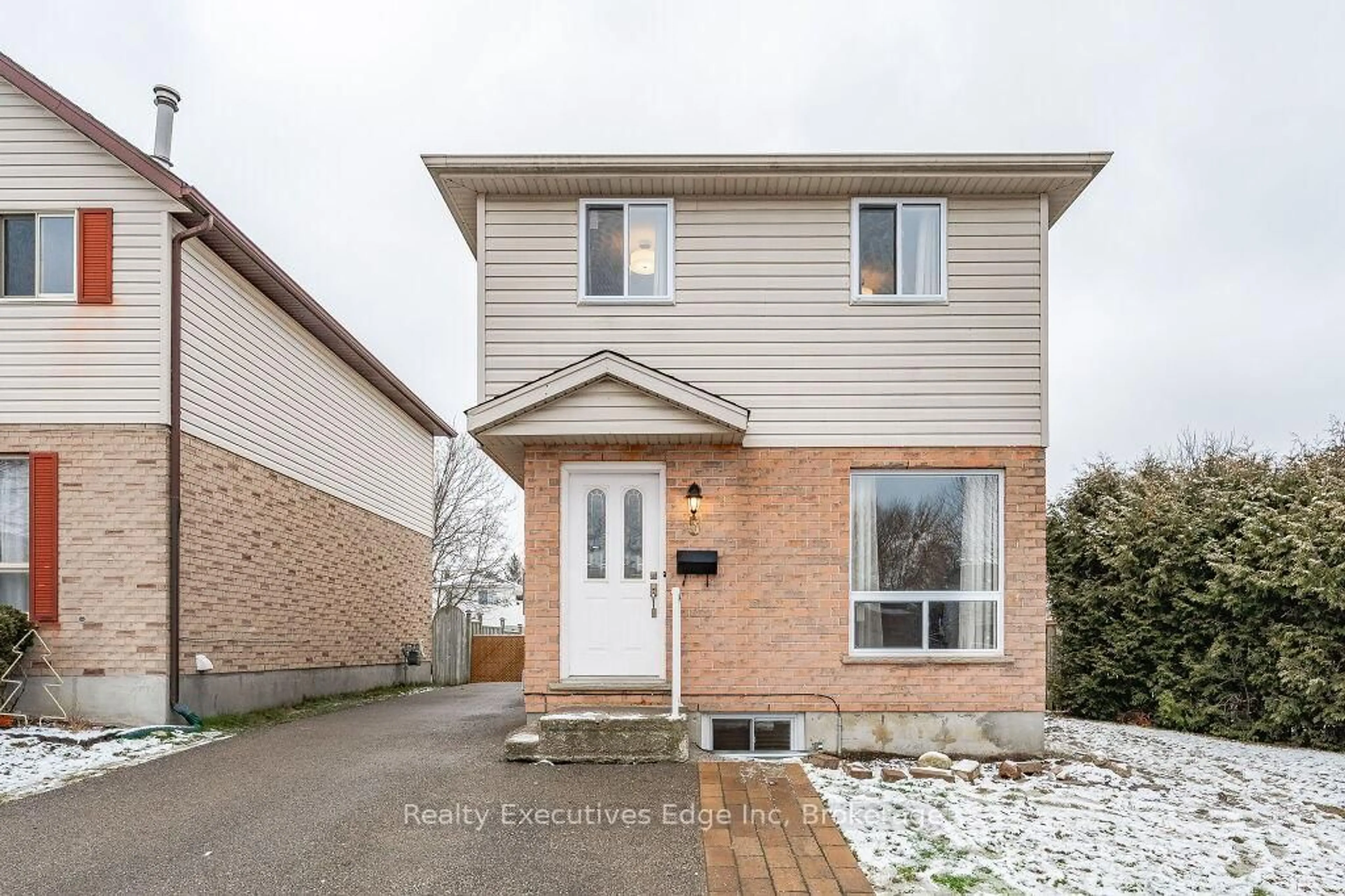 Home with brick exterior material, street for 5 Troy Cres, Guelph Ontario N1E 6W7