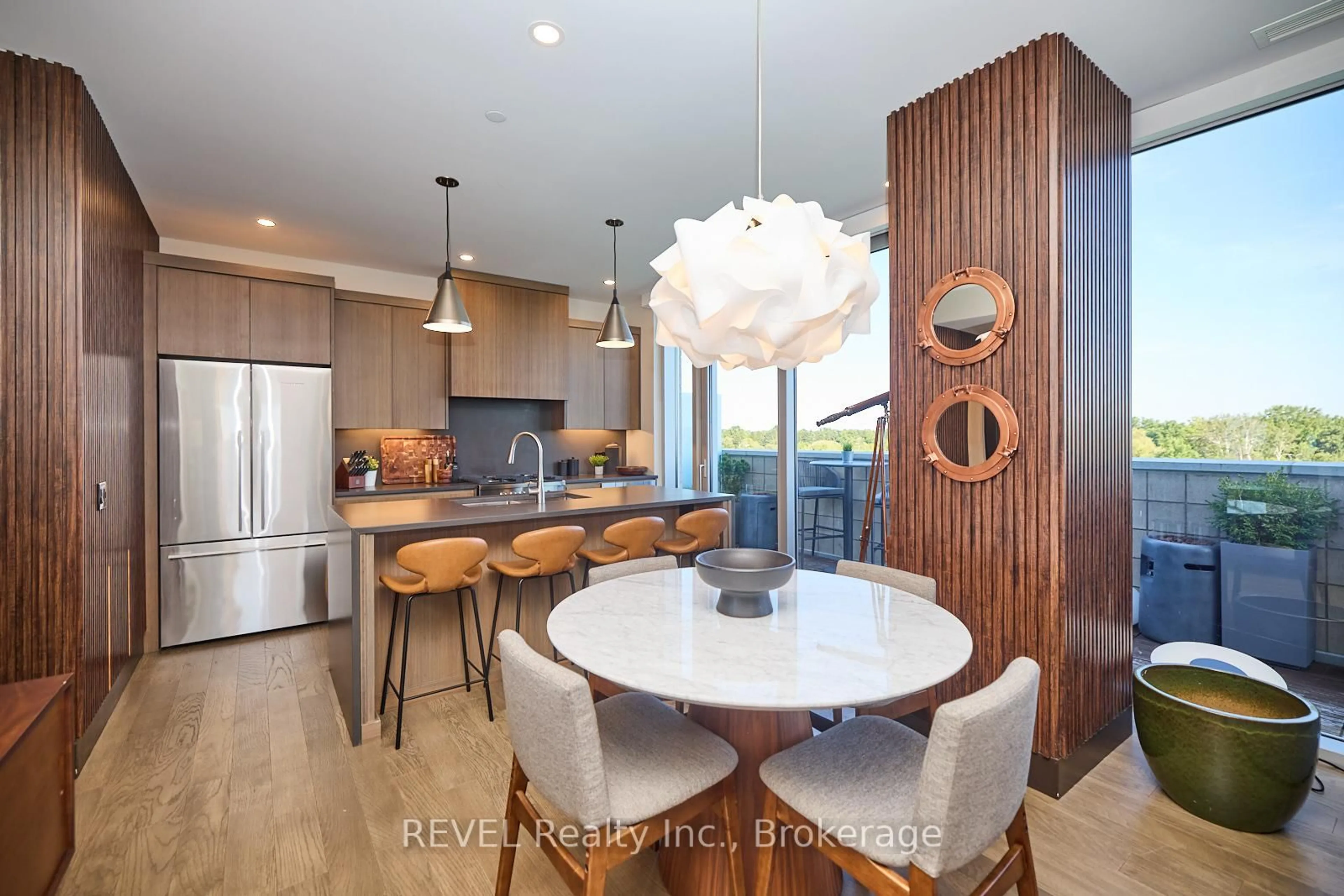 Open concept kitchen, wood/laminate floor for 57 Lakeport Rd #604, St. Catharines Ontario L2N 4P6