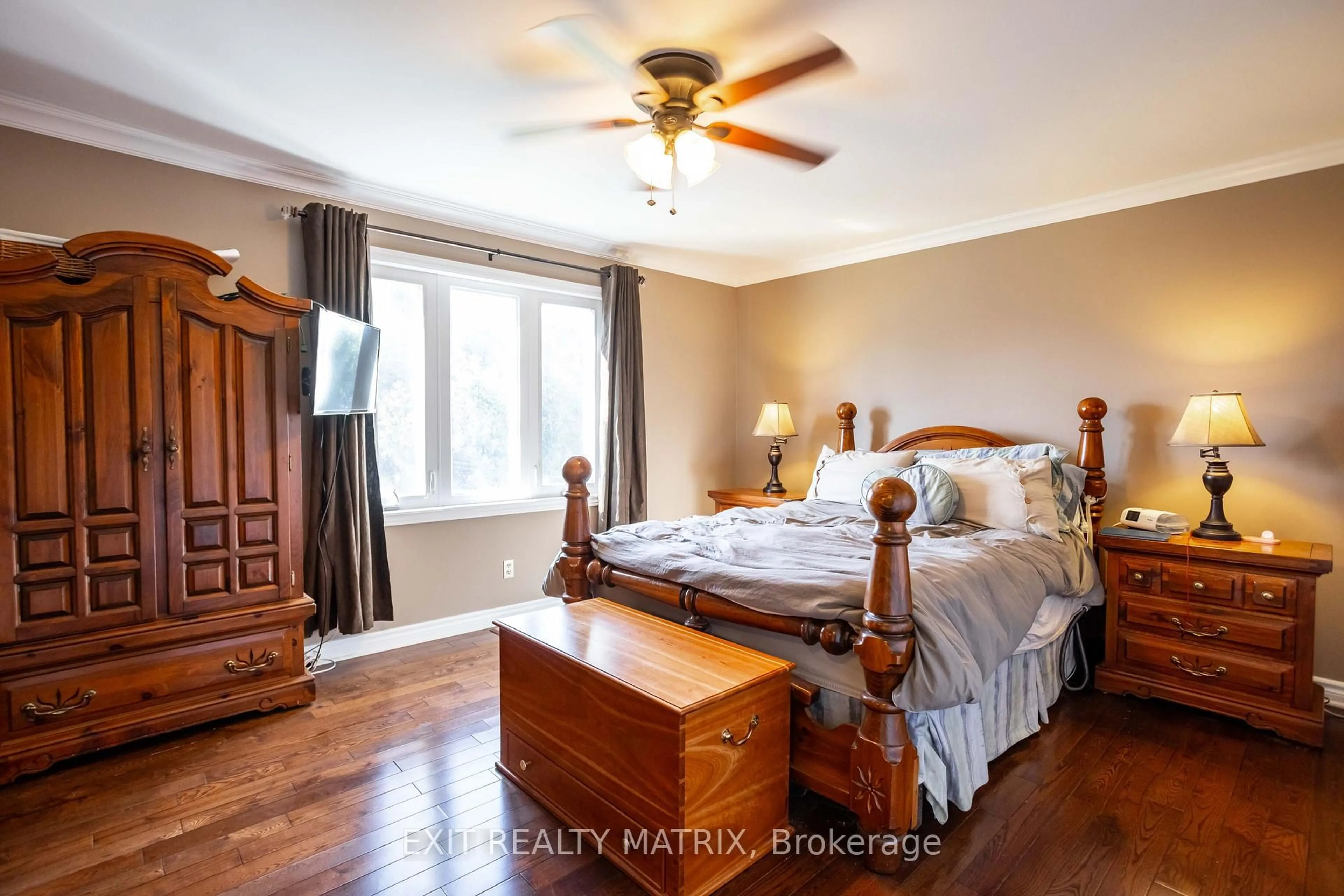 Bedroom with bed, wood/laminate floor for 21 Desnoyers St, Casselman Ontario K0A 1M0