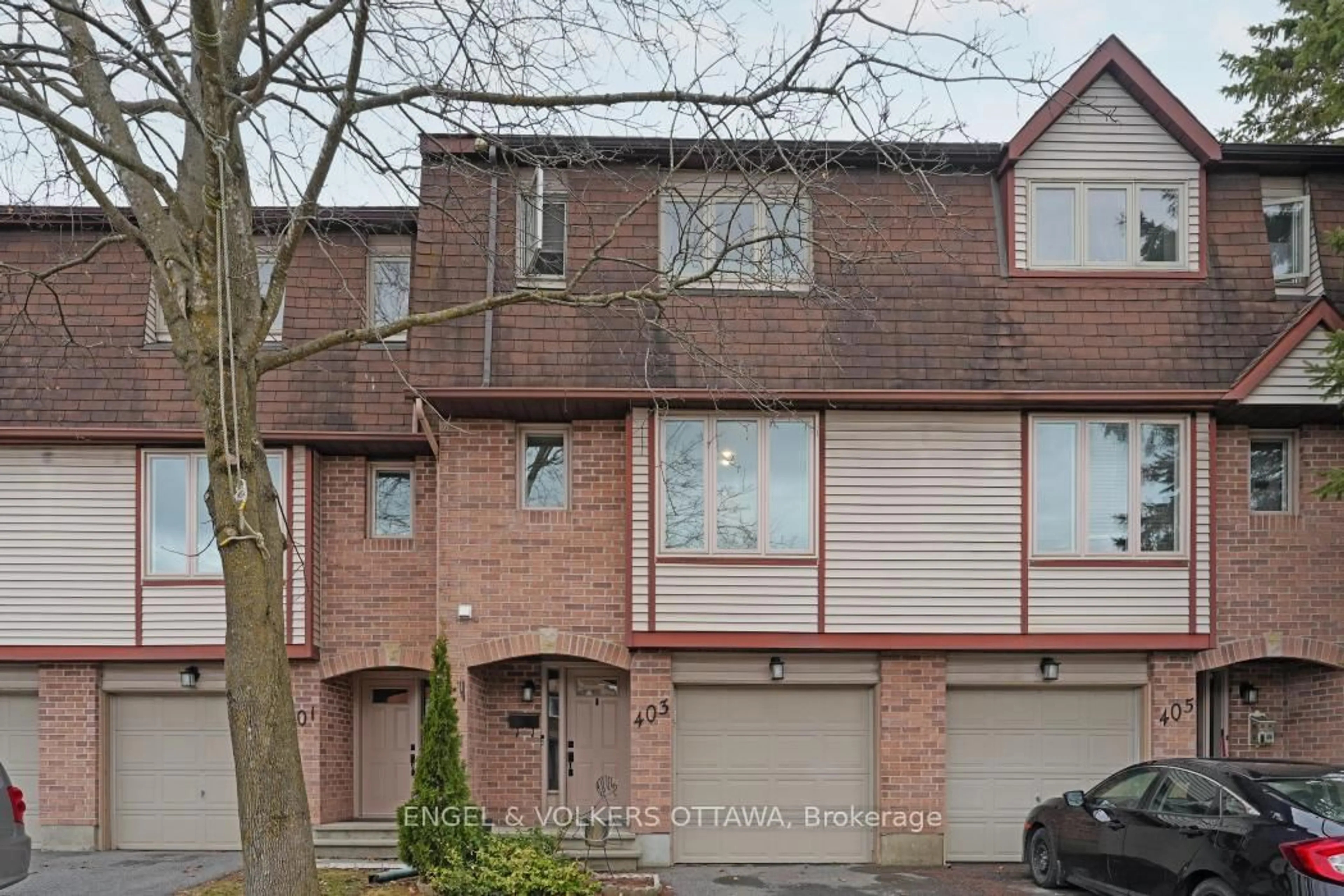 Home with brick exterior material, street for 403 Pickford Dr, Kanata Ontario K2L 3P7