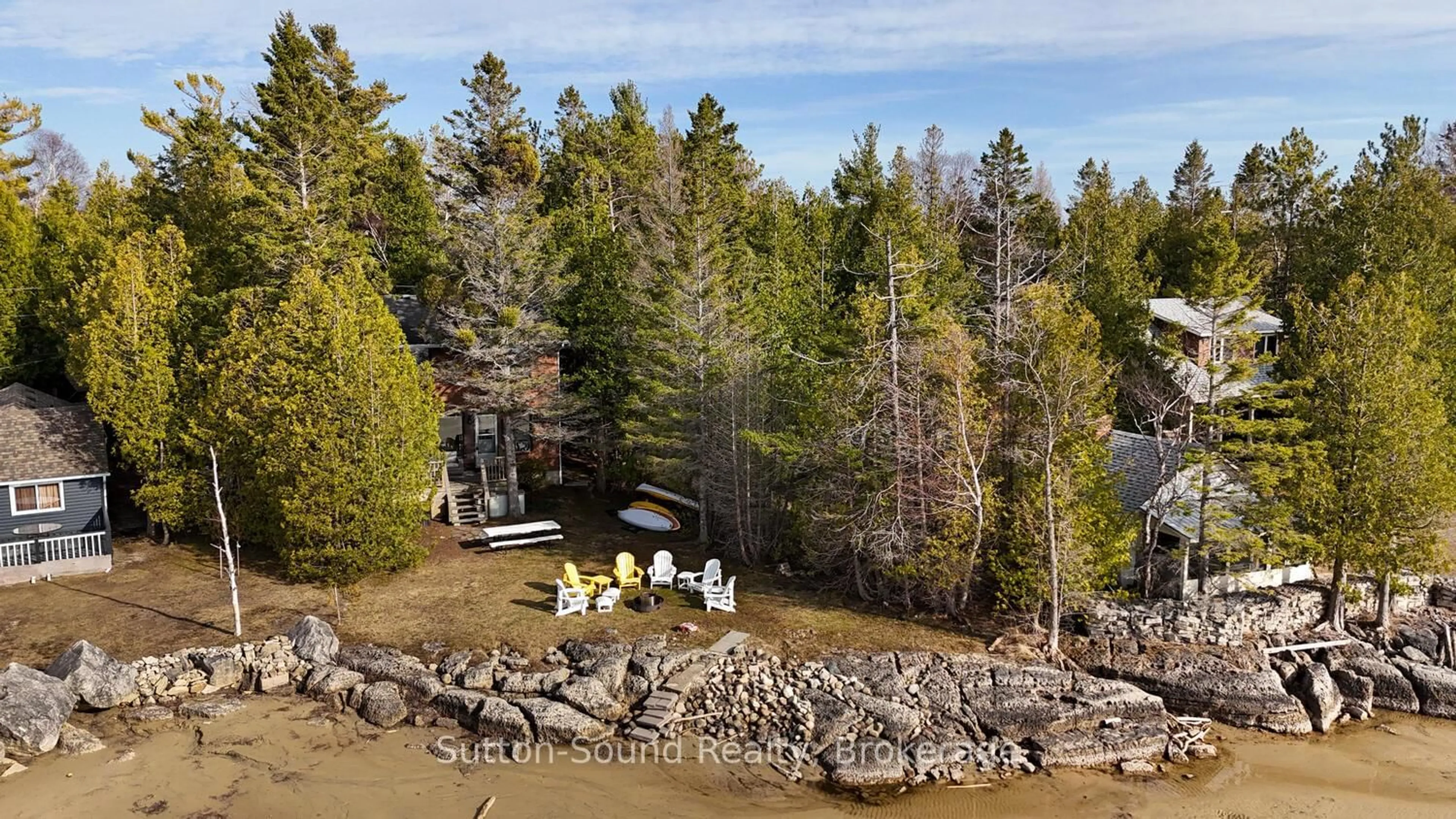 A pic from outside/outdoor area/front of a property/back of a property/a pic from drone, water/lake/river/ocean view for 604 Bay St, South Bruce Peninsula Ontario N0H 2T0