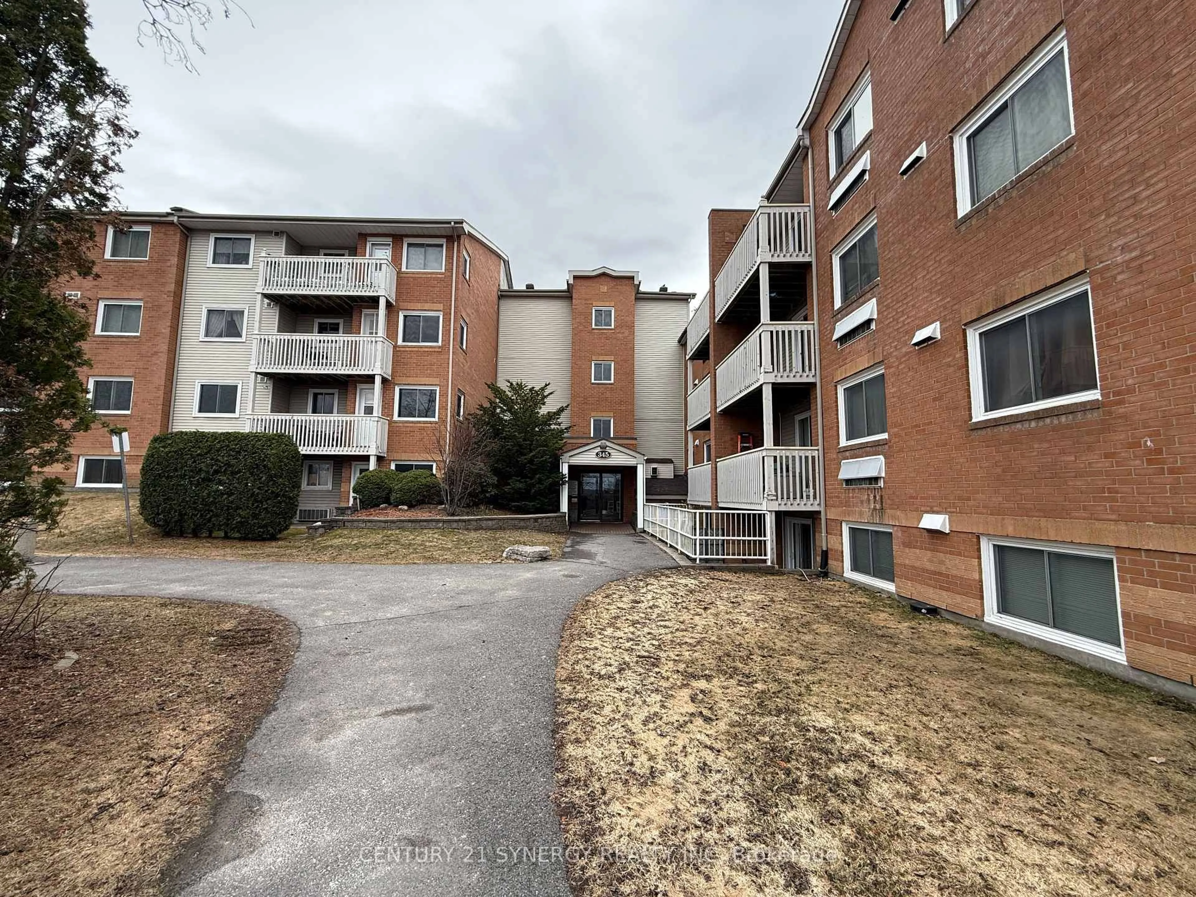 A pic from outside/outdoor area/front of a property/back of a property/a pic from drone, street for 345 Centrum Blvd #202, Ottawa Ontario K1E 3W9