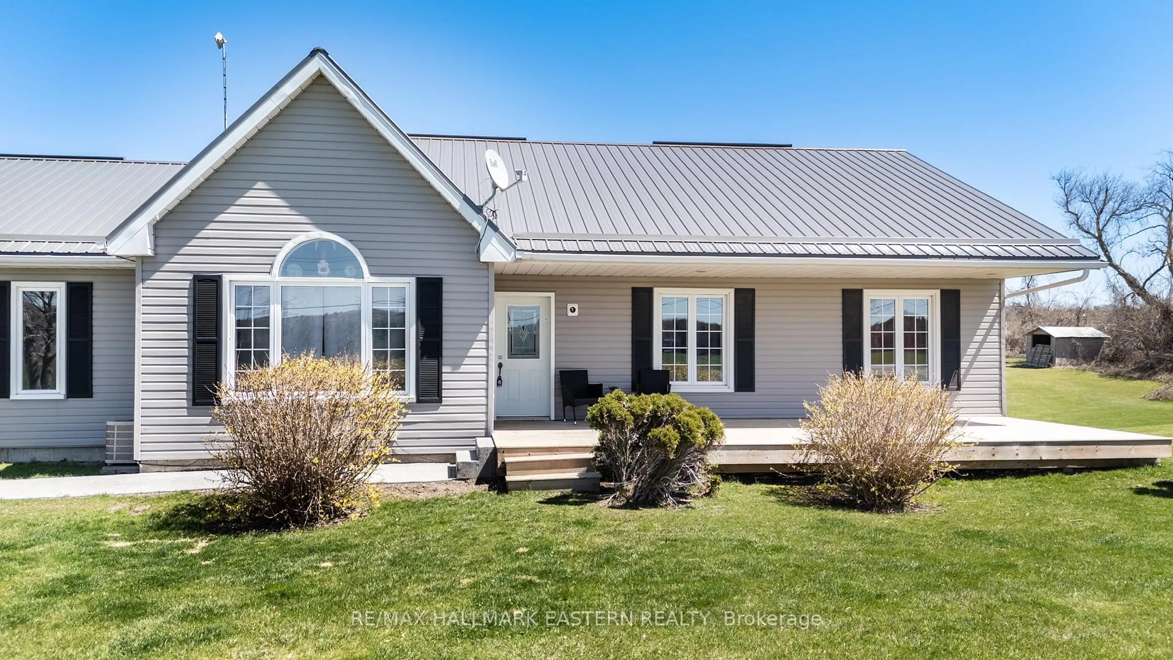 Home with vinyl exterior material, street for 2791 County Rd 30 Rd, Brighton Ontario K6K 1R0