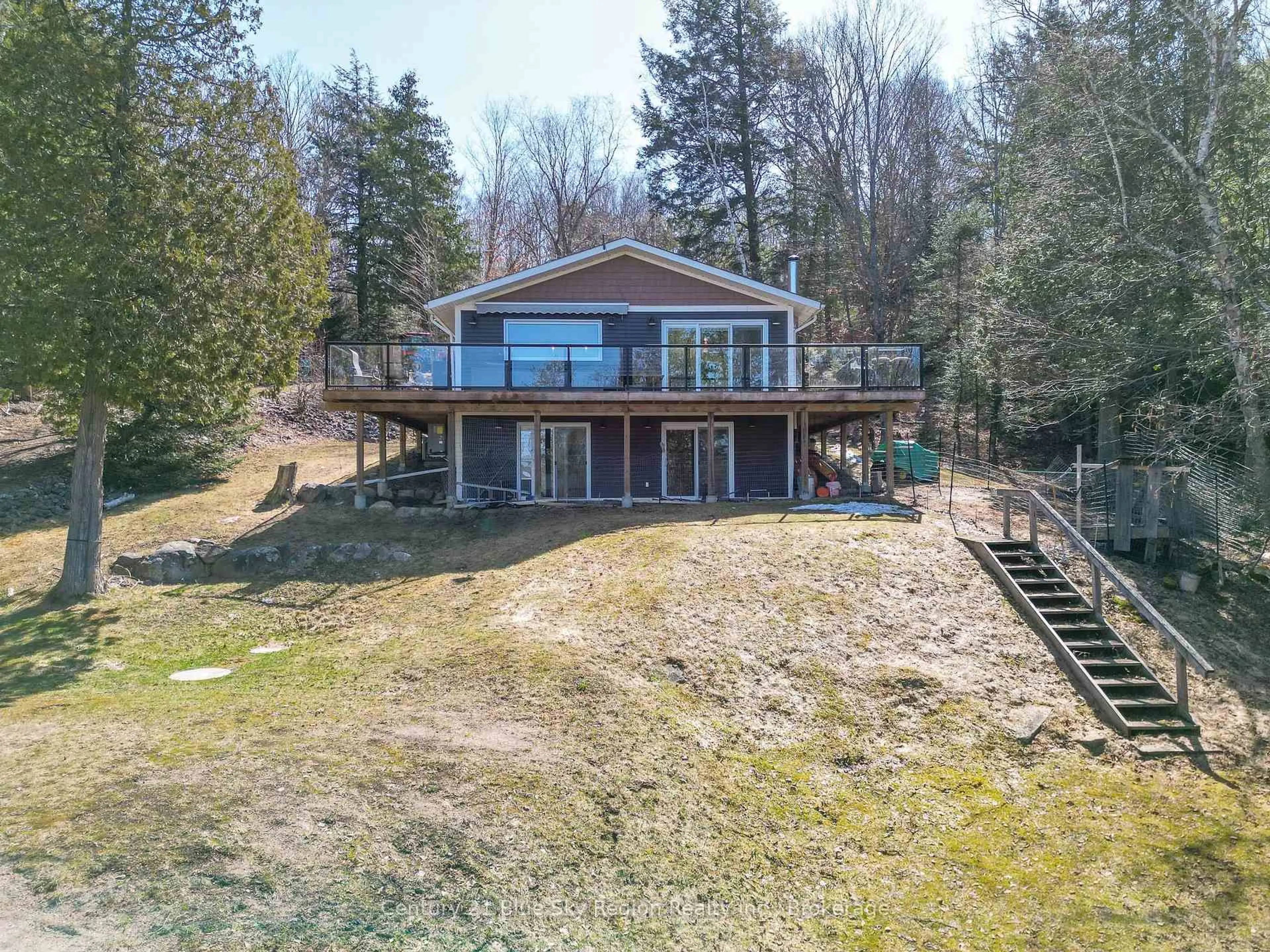 A pic from outside/outdoor area/front of a property/back of a property/a pic from drone, water/lake/river/ocean view for 55 Cedar Bay Rd, East Ferris Ontario P0H 1B0