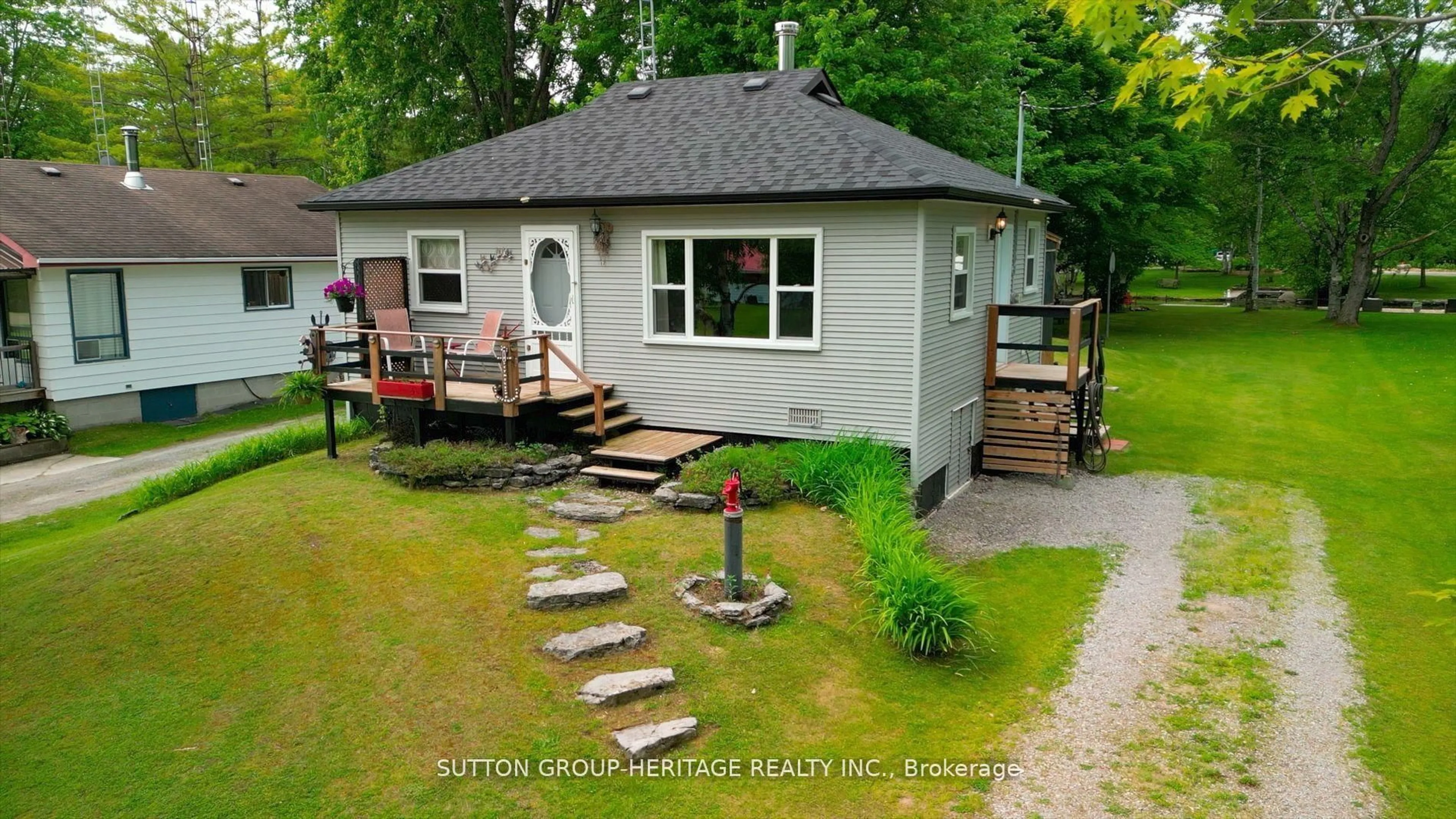 A pic from outside/outdoor area/front of a property/back of a property/a pic from drone, street for 15 Sackitt Rd, Kawartha Lakes Ontario K0M 1N0