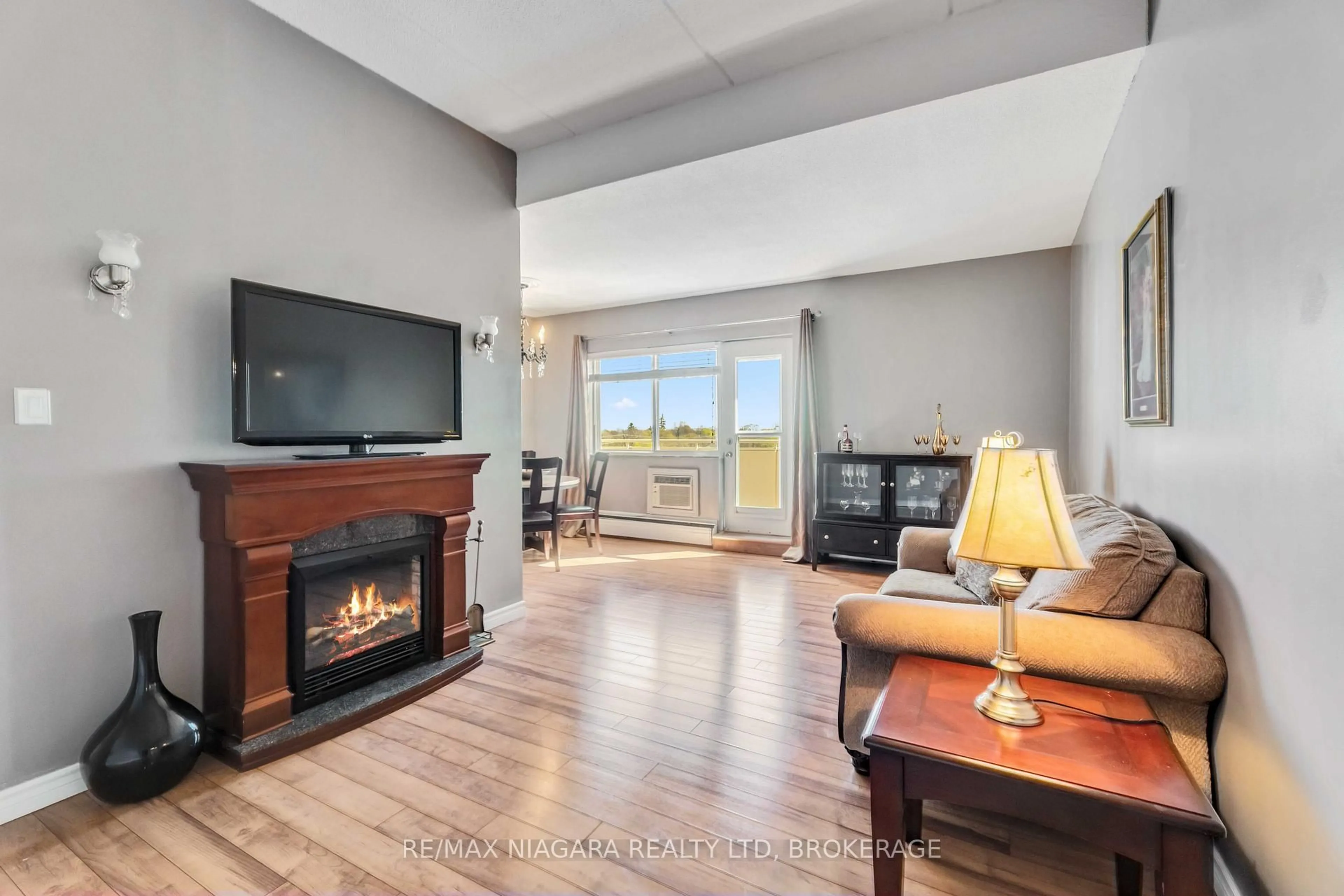Living room with furniture, unknown for 198 Scott St #506, St. Catharines Ontario L2N 5T3