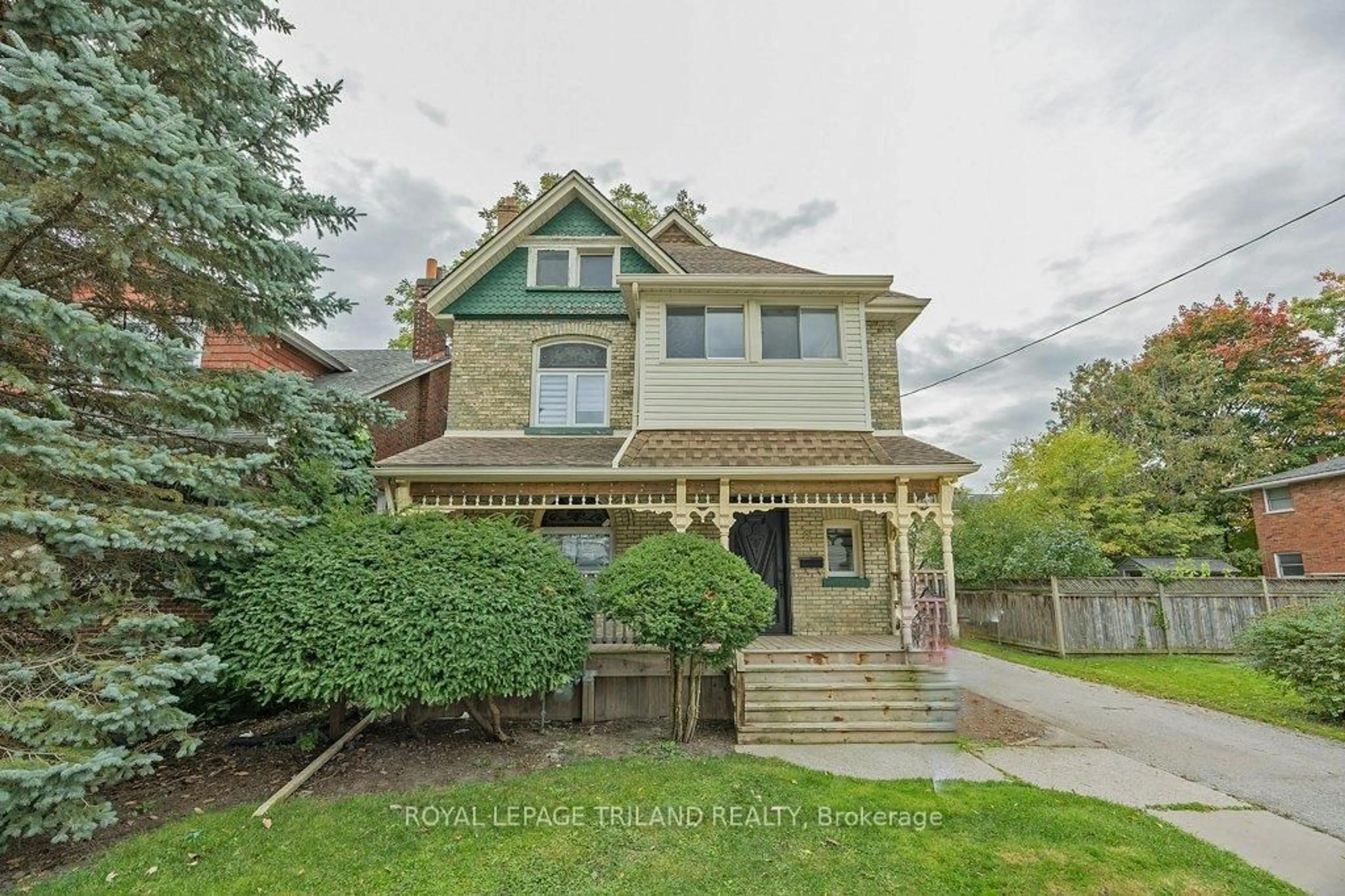 Home with brick exterior material, street for 8 Elizabeth St, St. Thomas Ontario N5R 2W9