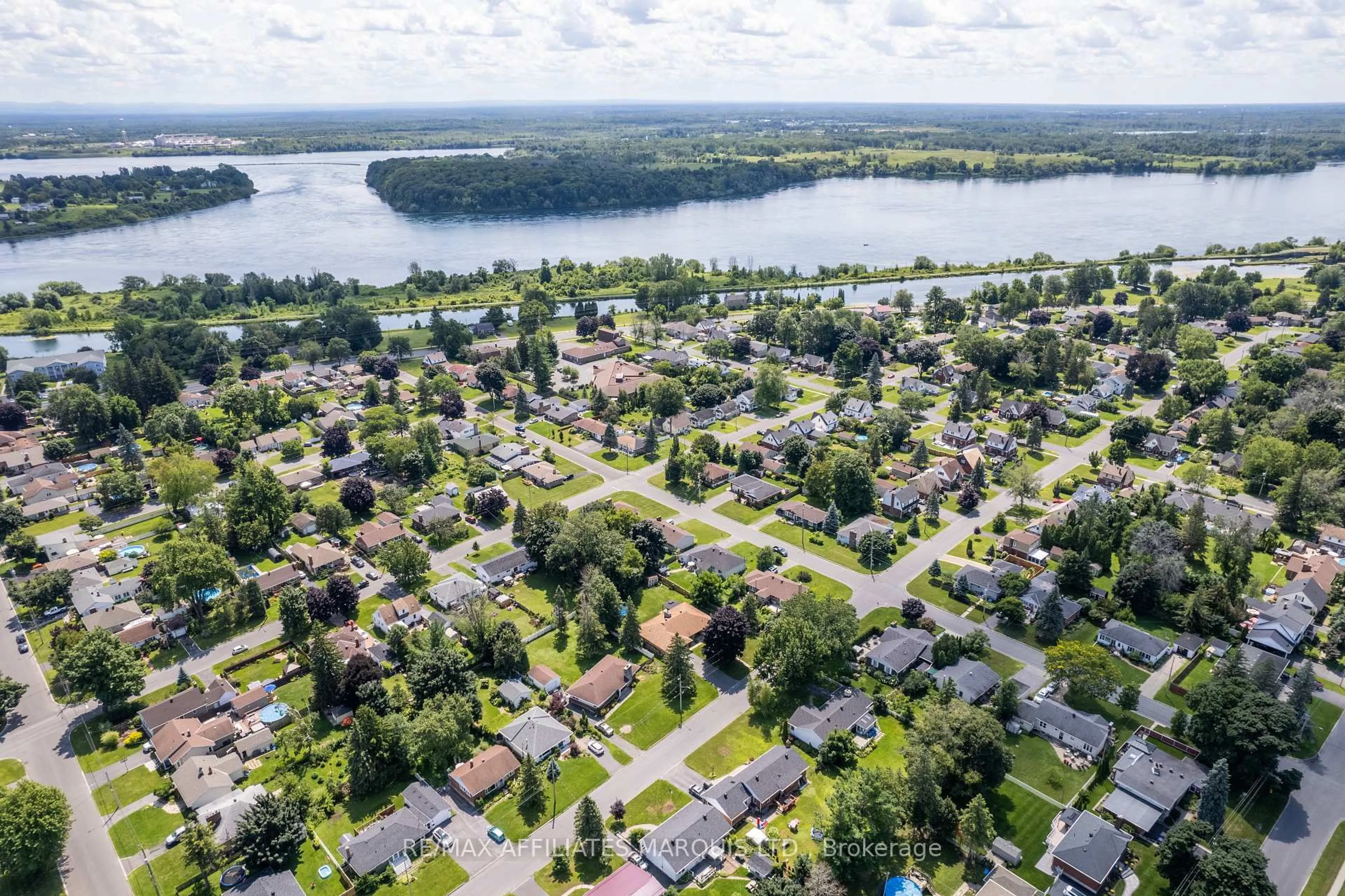 A pic from outside/outdoor area/front of a property/back of a property/a pic from drone, water/lake/river/ocean view for 1201 Princess St, Cornwall Ontario K6J 1S2