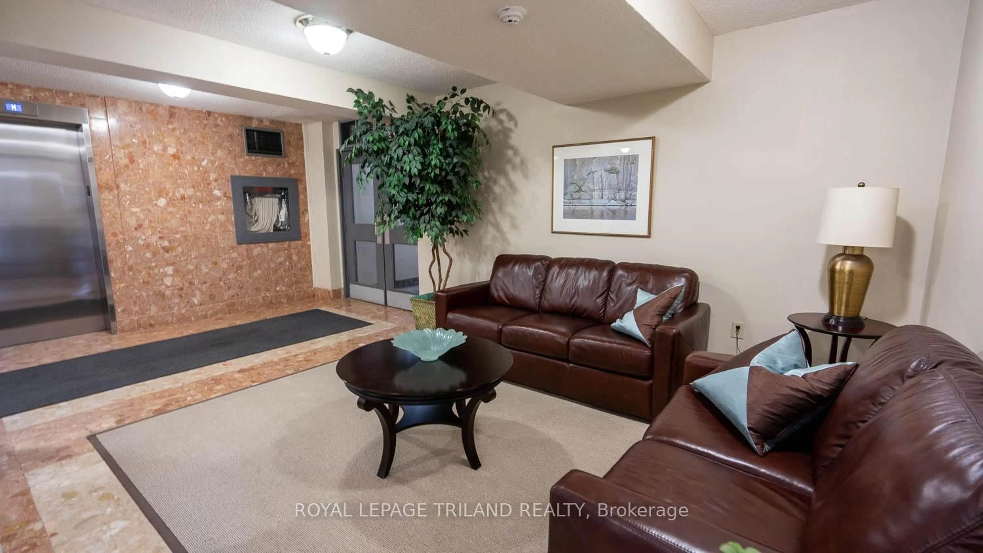 Living room with furniture, ceramic/tile floor for 1510 Richmond St #605, London North Ontario N6G 4V2