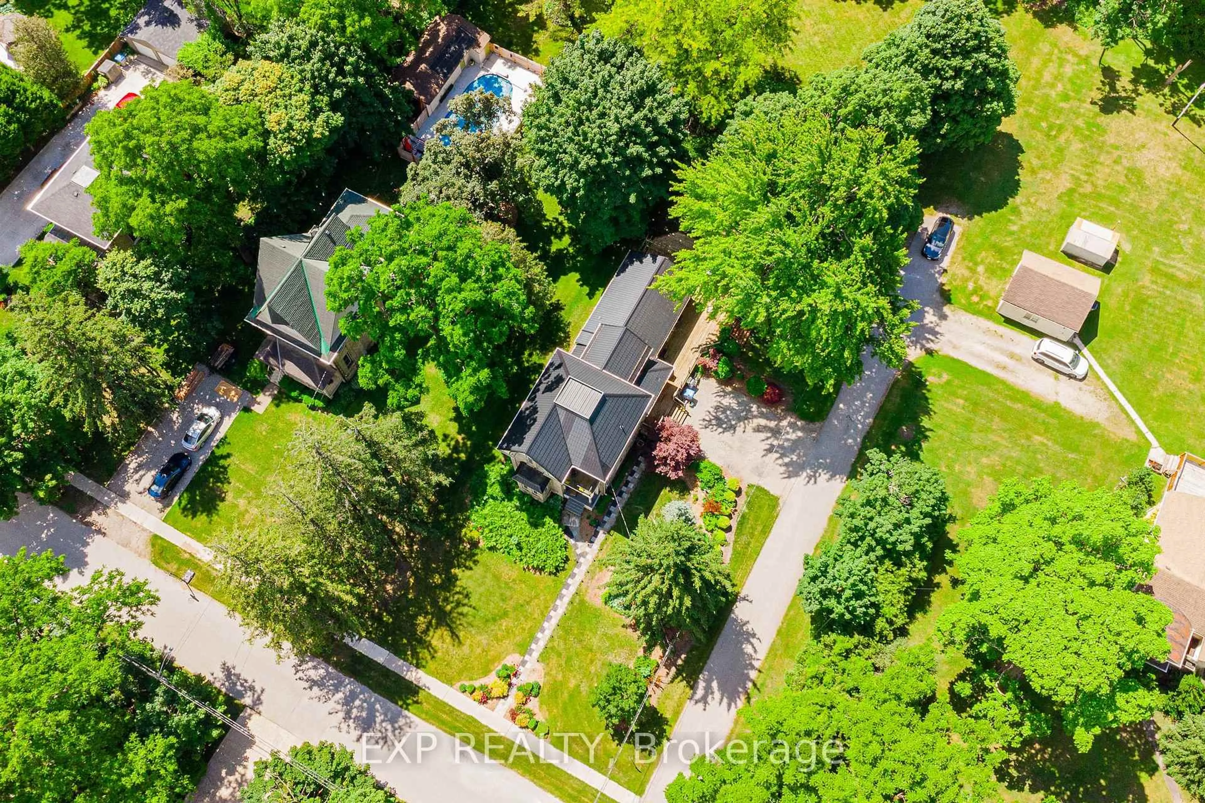 A pic from outside/outdoor area/front of a property/back of a property/a pic from drone, street for 283 Hastings St, North Middlesex Ontario N0M 2K0