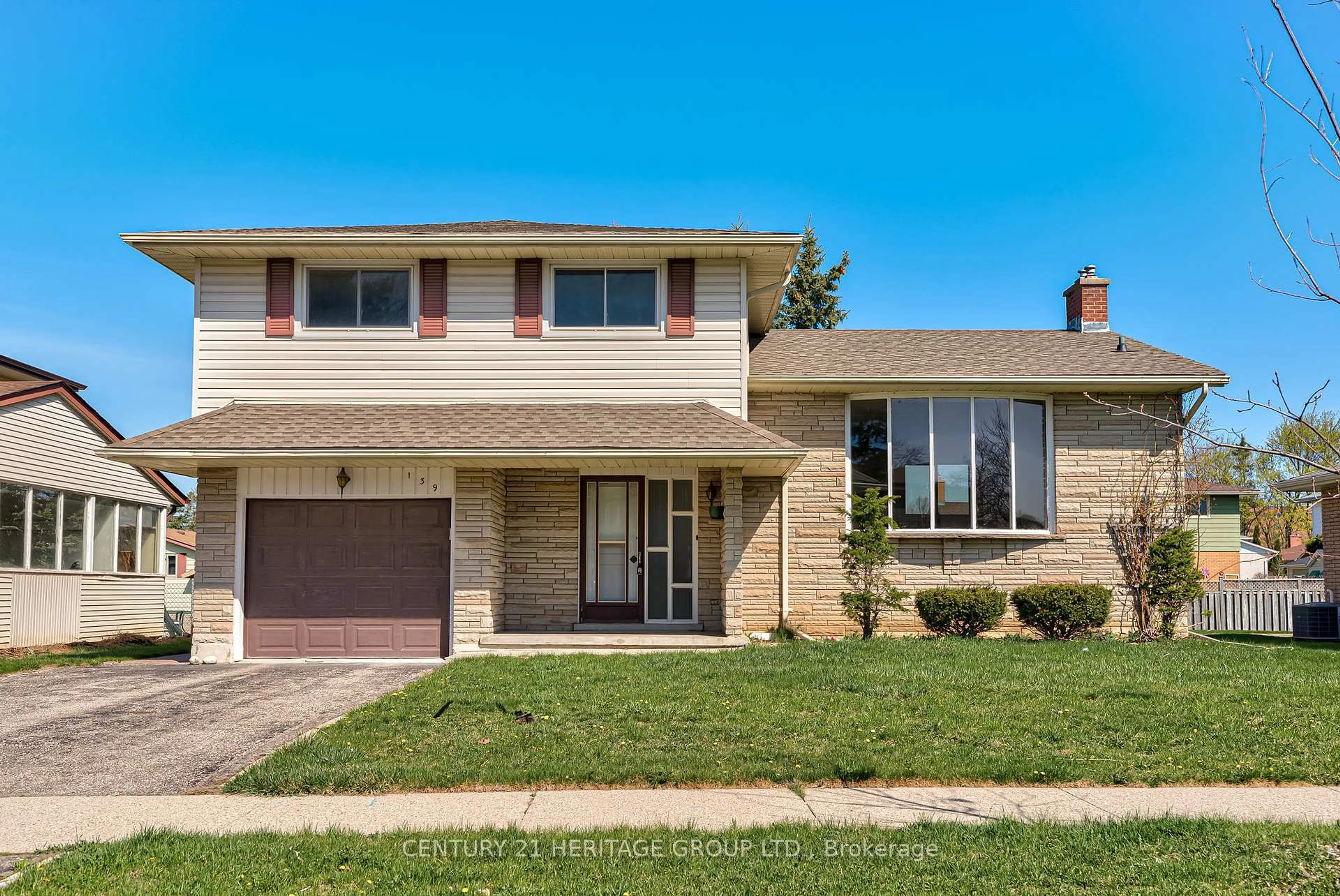 Home with brick exterior material, street for 139 Strathcona Cres, Kitchener Ontario N2B 2W8