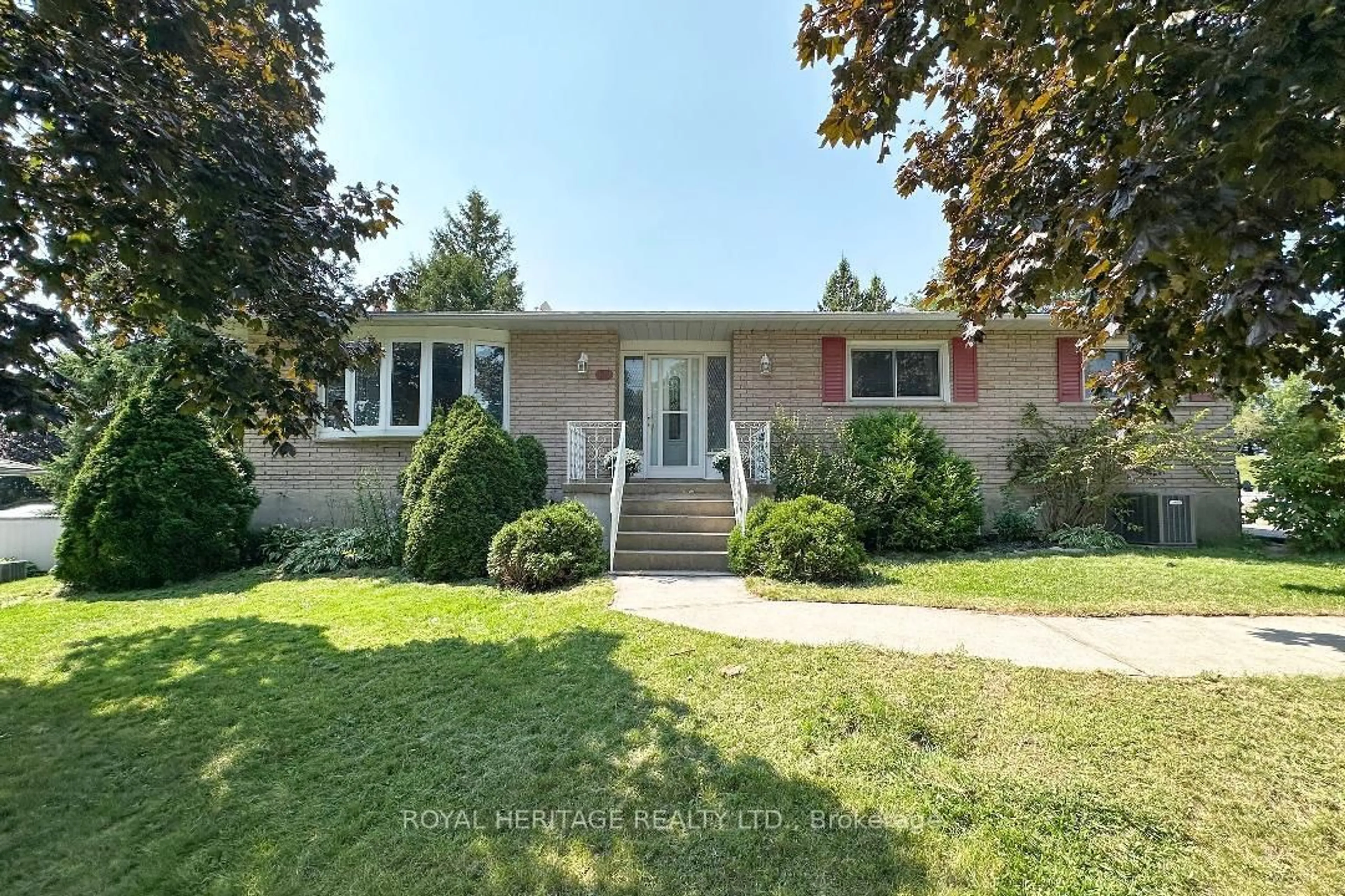 Home with brick exterior material, street for 64 Huntingwood Dr, Belleville Ontario K8N 4Z5