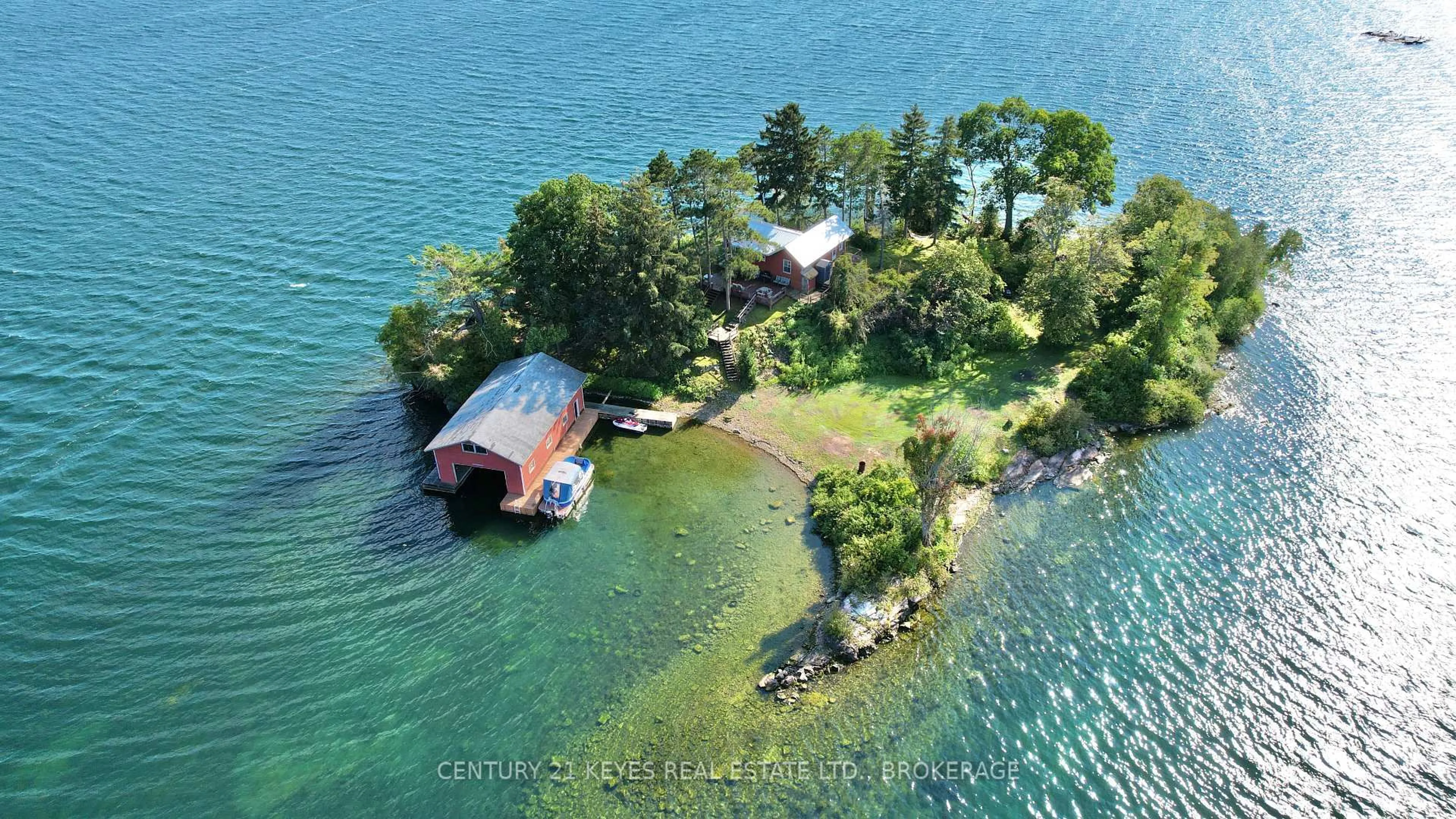 A pic from outside/outdoor area/front of a property/back of a property/a pic from drone, water/lake/river/ocean view for 1 O'CONOR Island, Lansdowne Ontario K0E 1L0