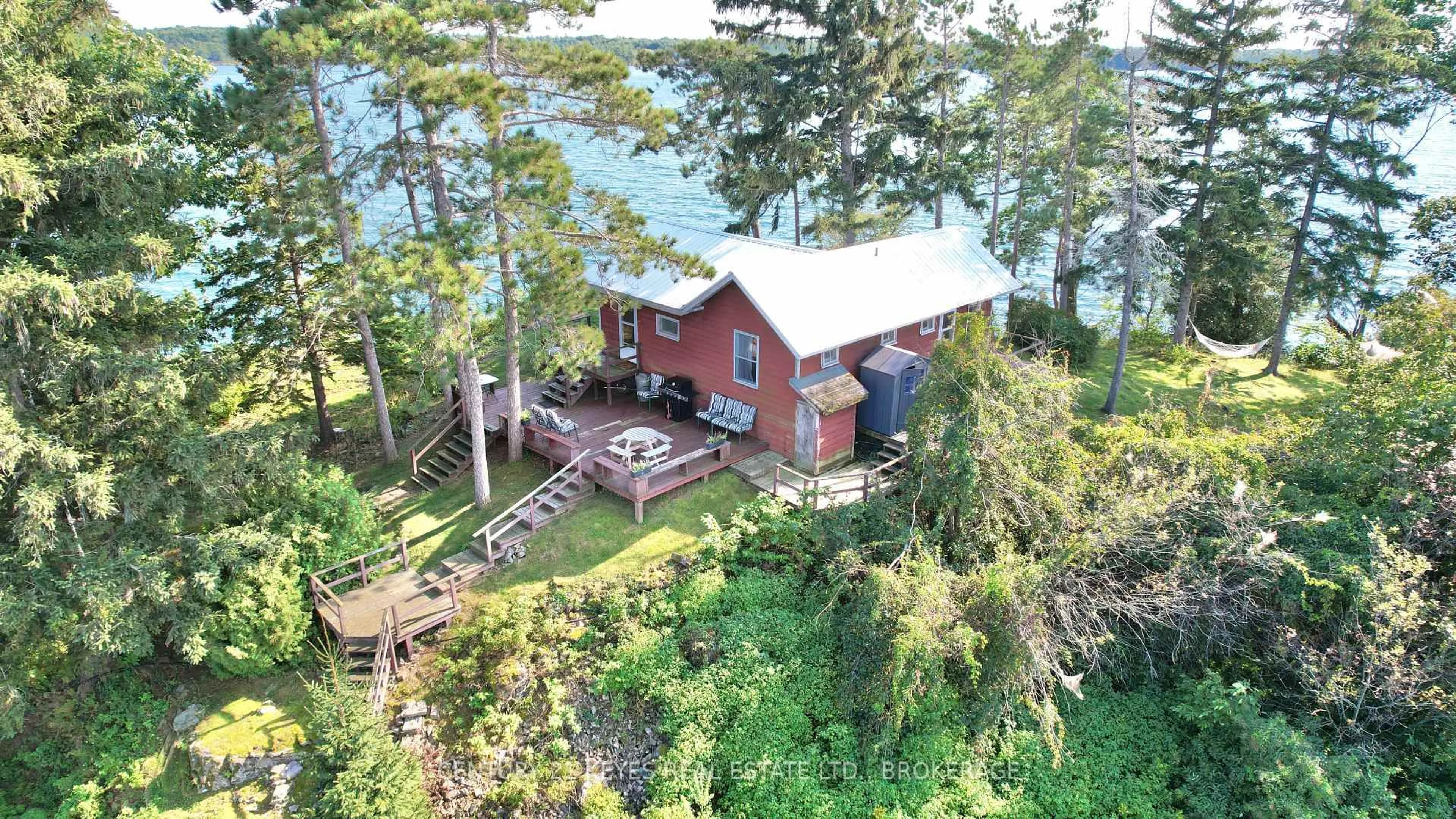 A pic from outside/outdoor area/front of a property/back of a property/a pic from drone, water/lake/river/ocean view for 1 O'CONOR Island, Lansdowne Ontario K0E 1L0