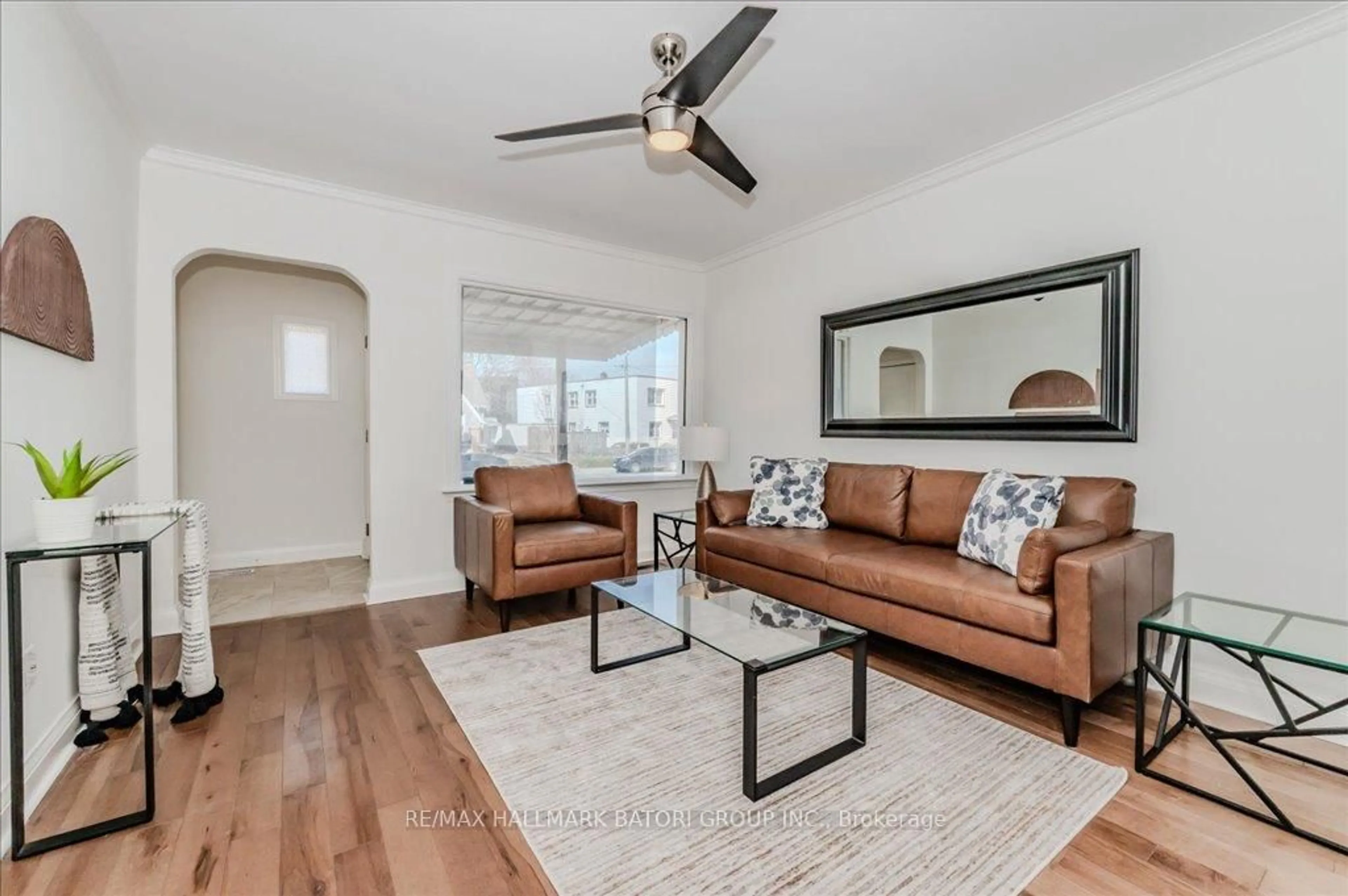 Living room with furniture, wood/laminate floor for 61 Stirling Ave, Kitchener Ontario N2G 3N8