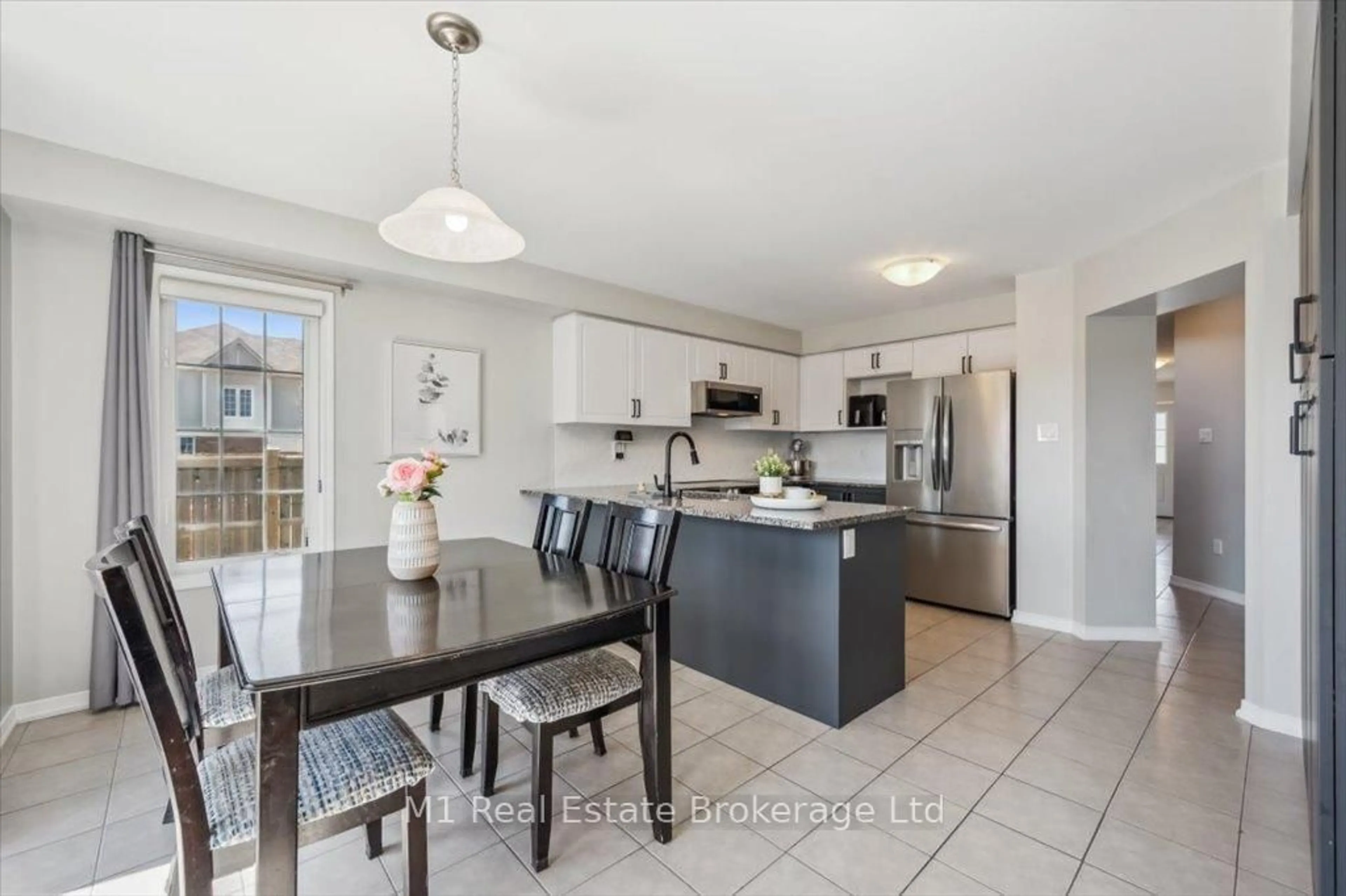 Open concept kitchen, ceramic/tile floor for 161 Starlight Ave, Woolwich Ontario N0B 1M0