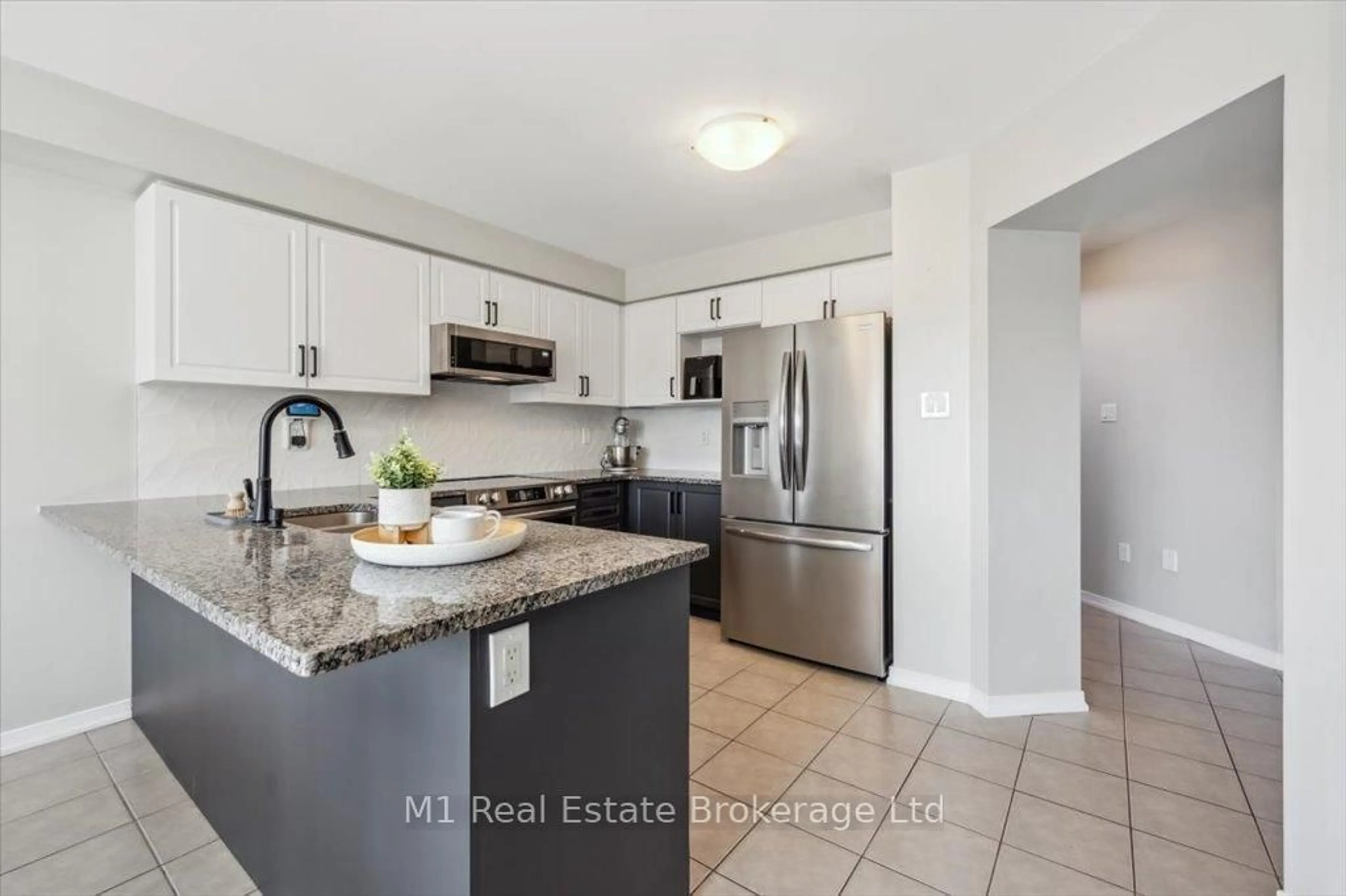 Open concept kitchen, ceramic/tile floor for 161 Starlight Ave, Woolwich Ontario N0B 1M0