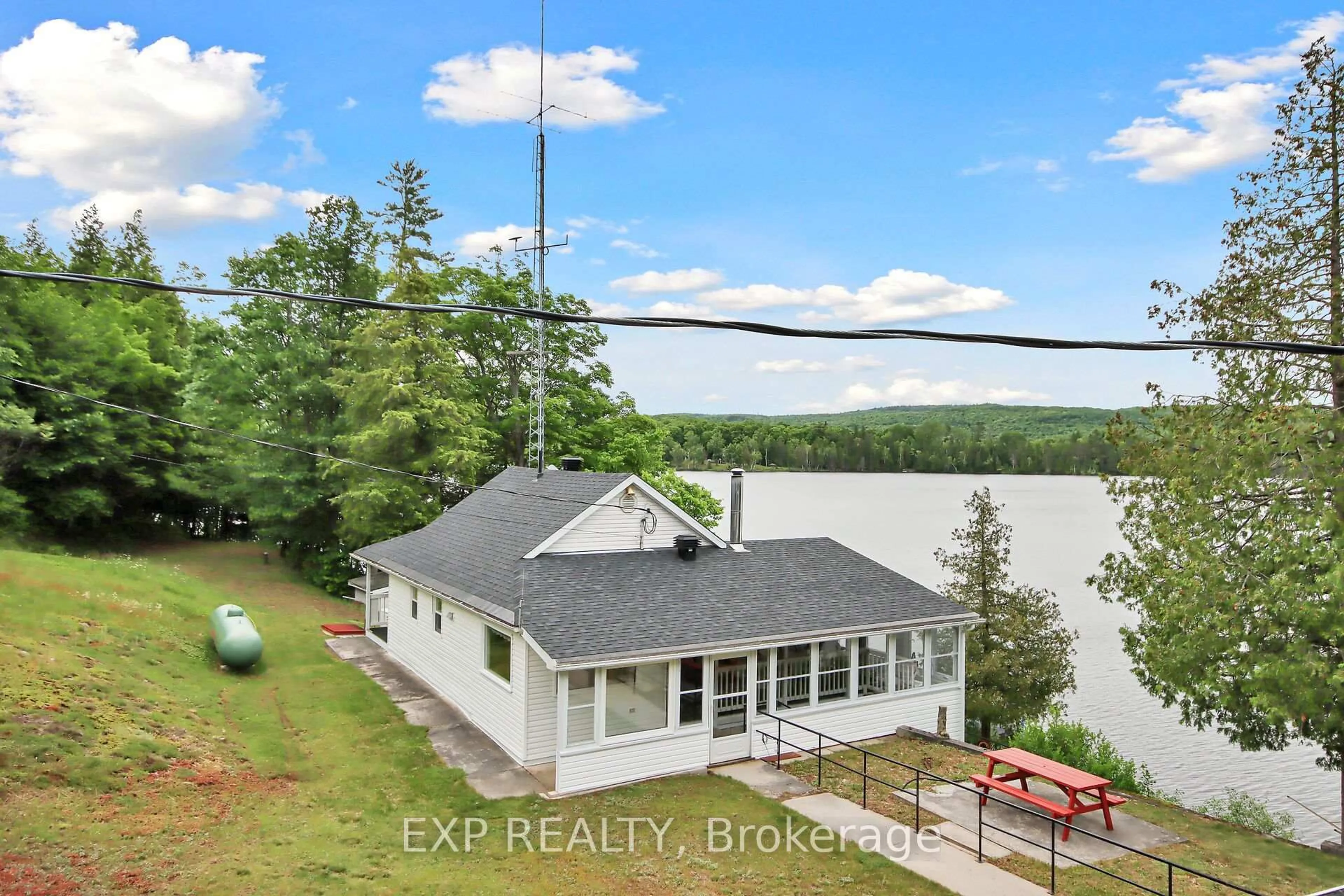 A pic from outside/outdoor area/front of a property/back of a property/a pic from drone, water/lake/river/ocean view for 1876 FLOWER STATION Rd, Lanark Ontario K0G 1K0