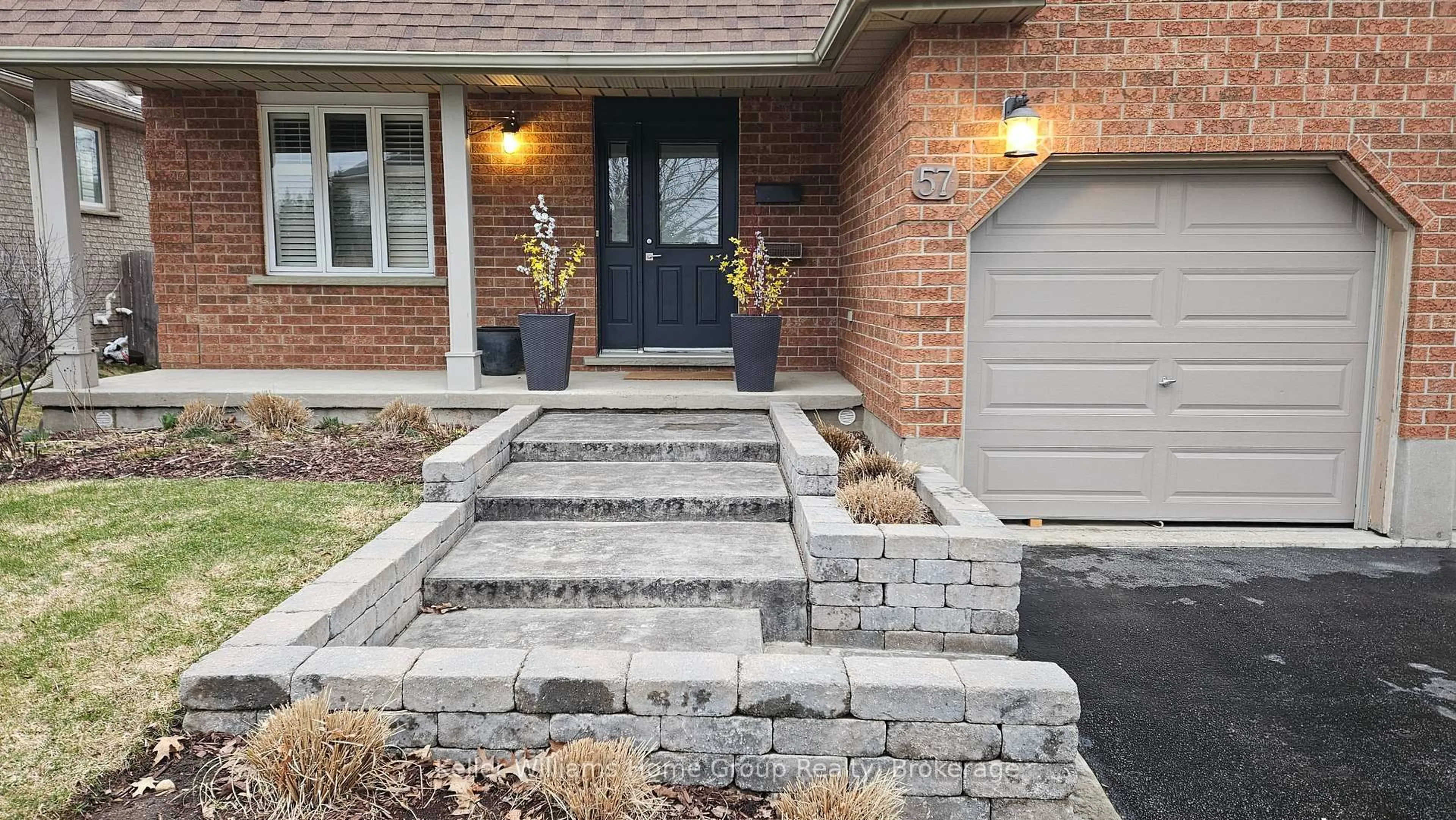 Home with brick exterior material, street for 57 Flaherty Dr, Guelph Ontario N1H 8K6