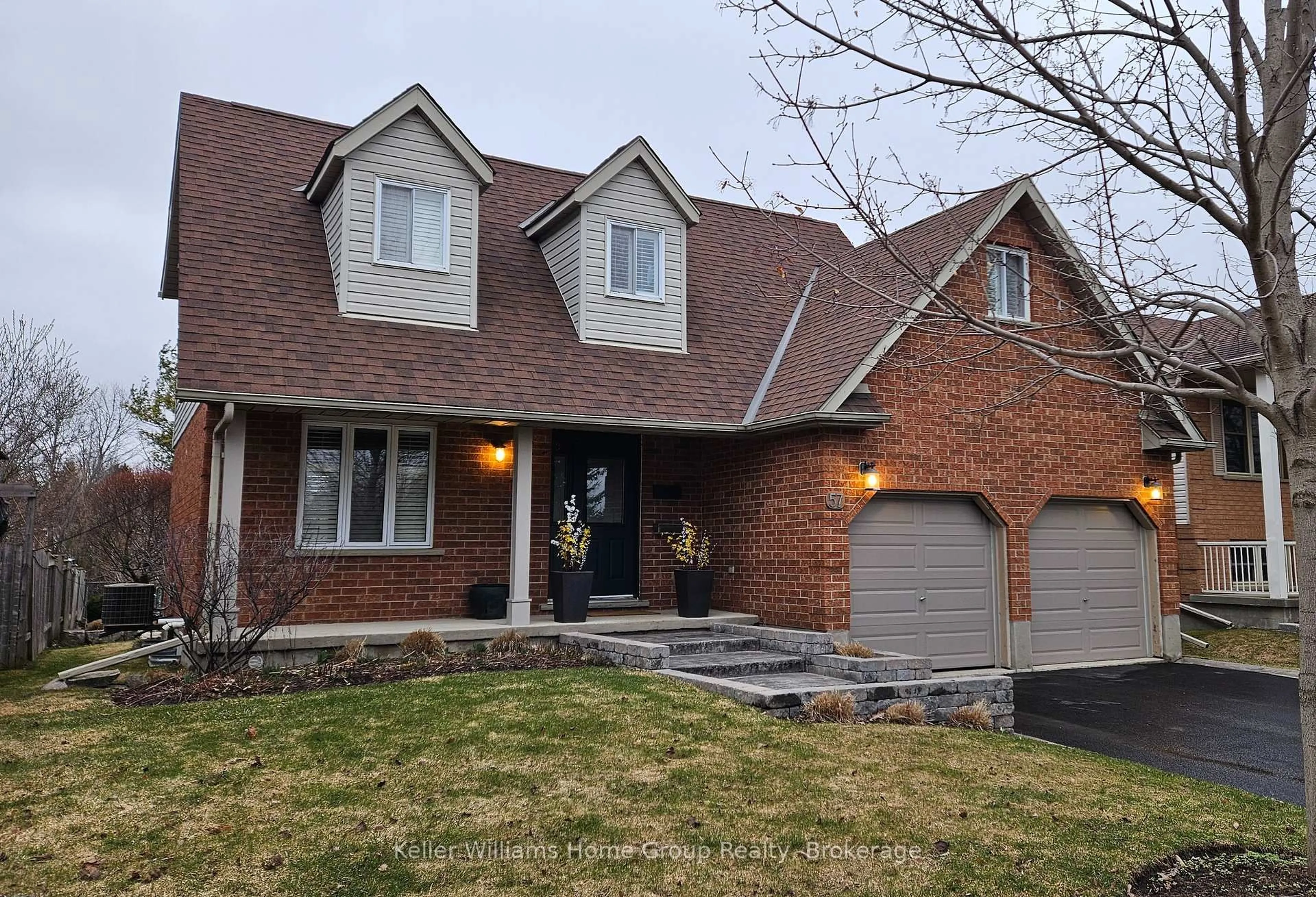 Home with brick exterior material, street for 57 Flaherty Dr, Guelph Ontario N1H 8K6
