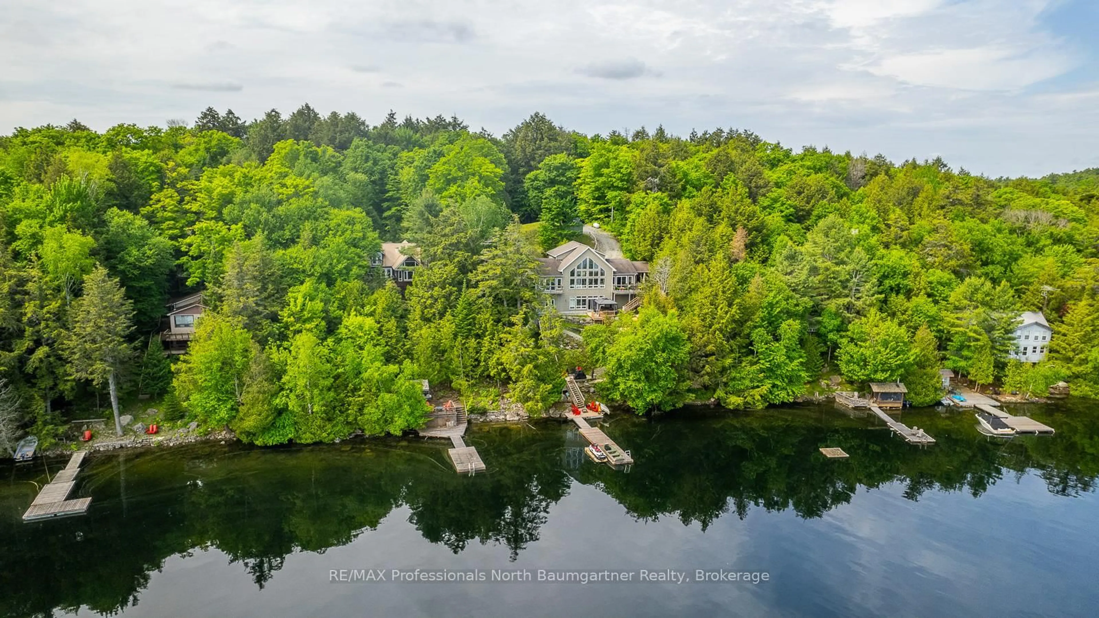A pic from outside/outdoor area/front of a property/back of a property/a pic from drone, water/lake/river/ocean view for 1107 PINE POINT Rd, Dysart et al Ontario K0M 1S0