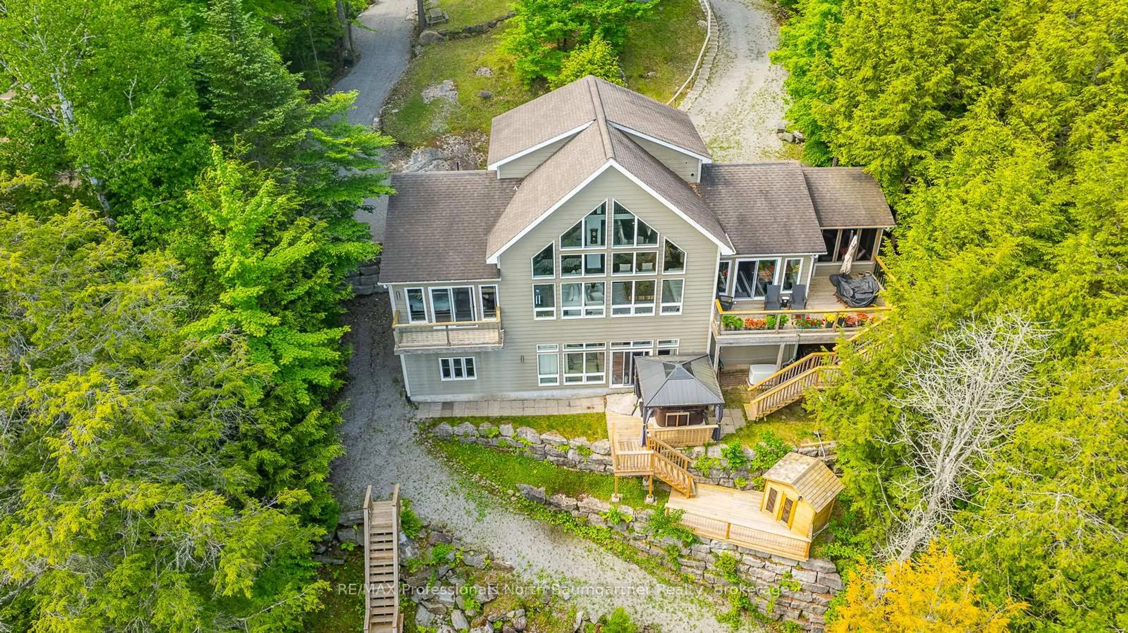A pic from outside/outdoor area/front of a property/back of a property/a pic from drone, unknown for 1107 PINE POINT Rd, Dysart et al Ontario K0M 1S0