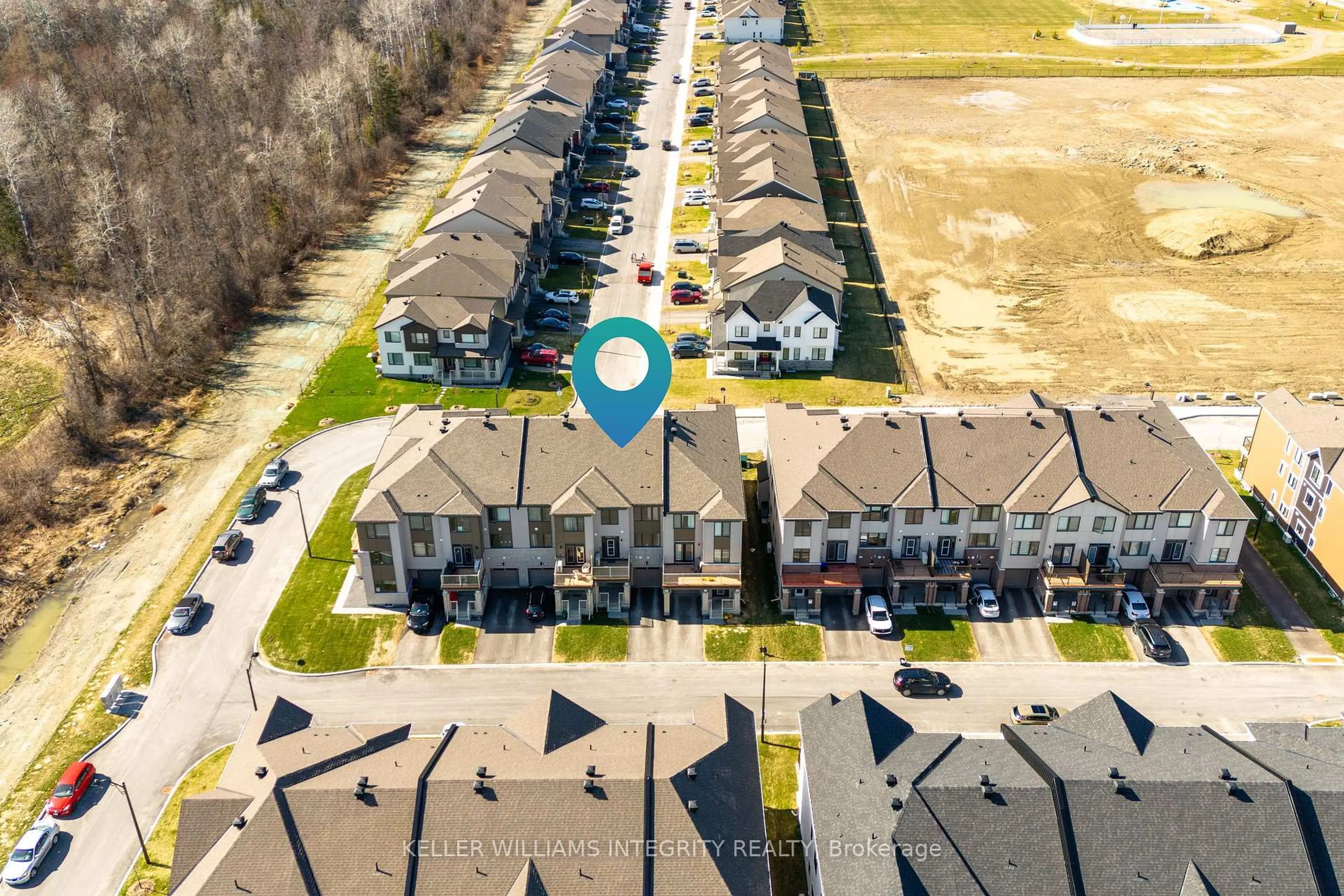 A pic from outside/outdoor area/front of a property/back of a property/a pic from drone, street for 56 Stitch Mews, Richmond Ontario K0A 2Z0