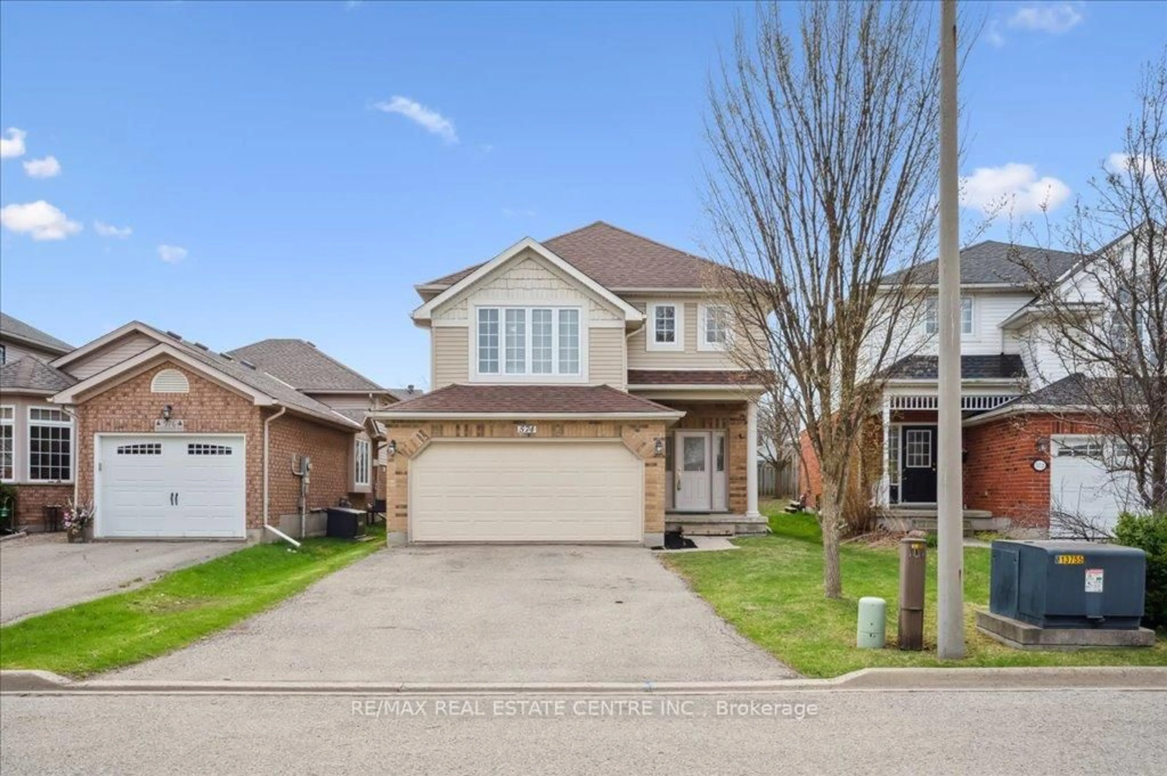 Home with brick exterior material, street for 574 Windjammer Way, Waterloo Ontario N2K 3Z5