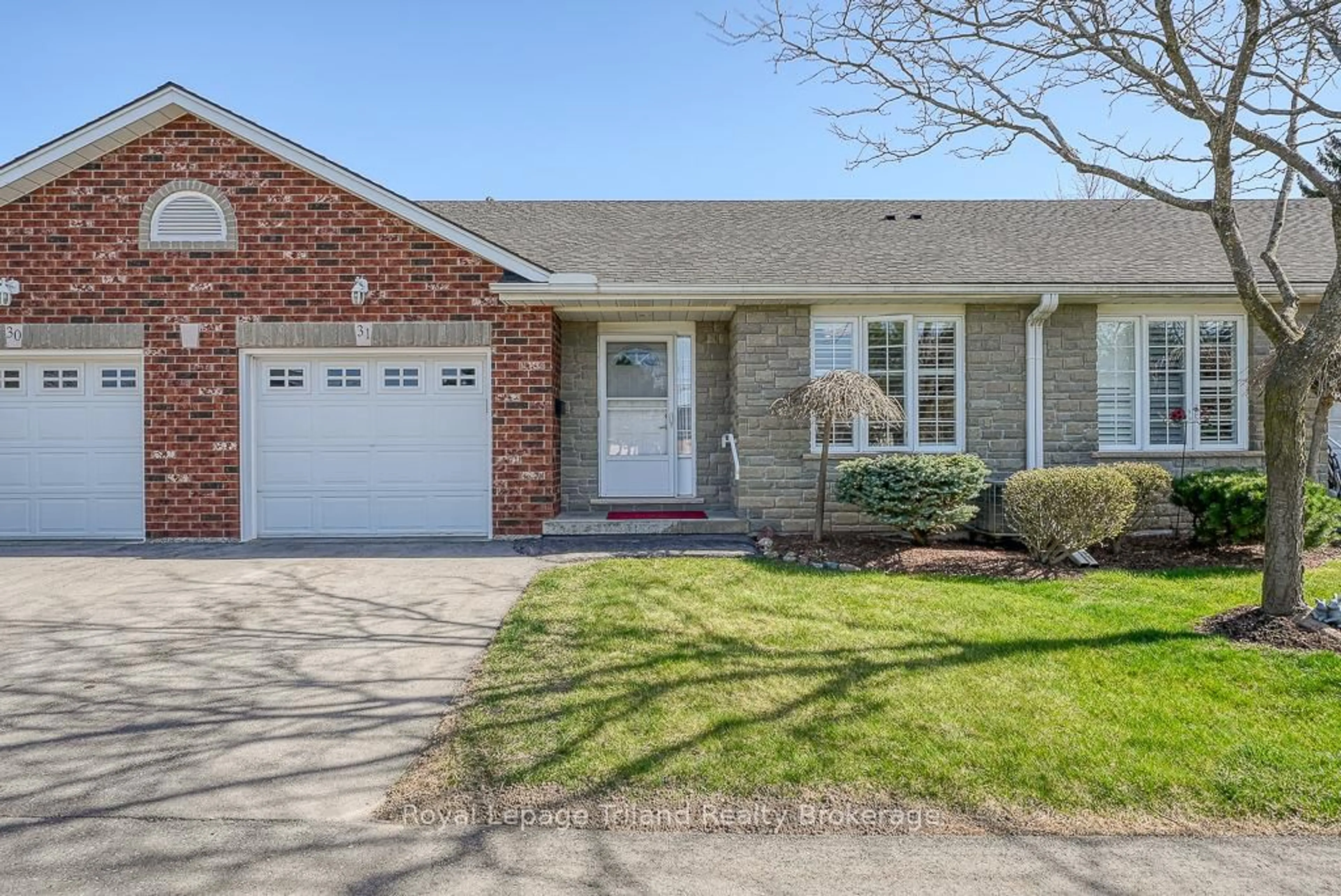 Home with brick exterior material, street for 53 Heron's Landing #31, Woodstock Ontario N4T 1V2