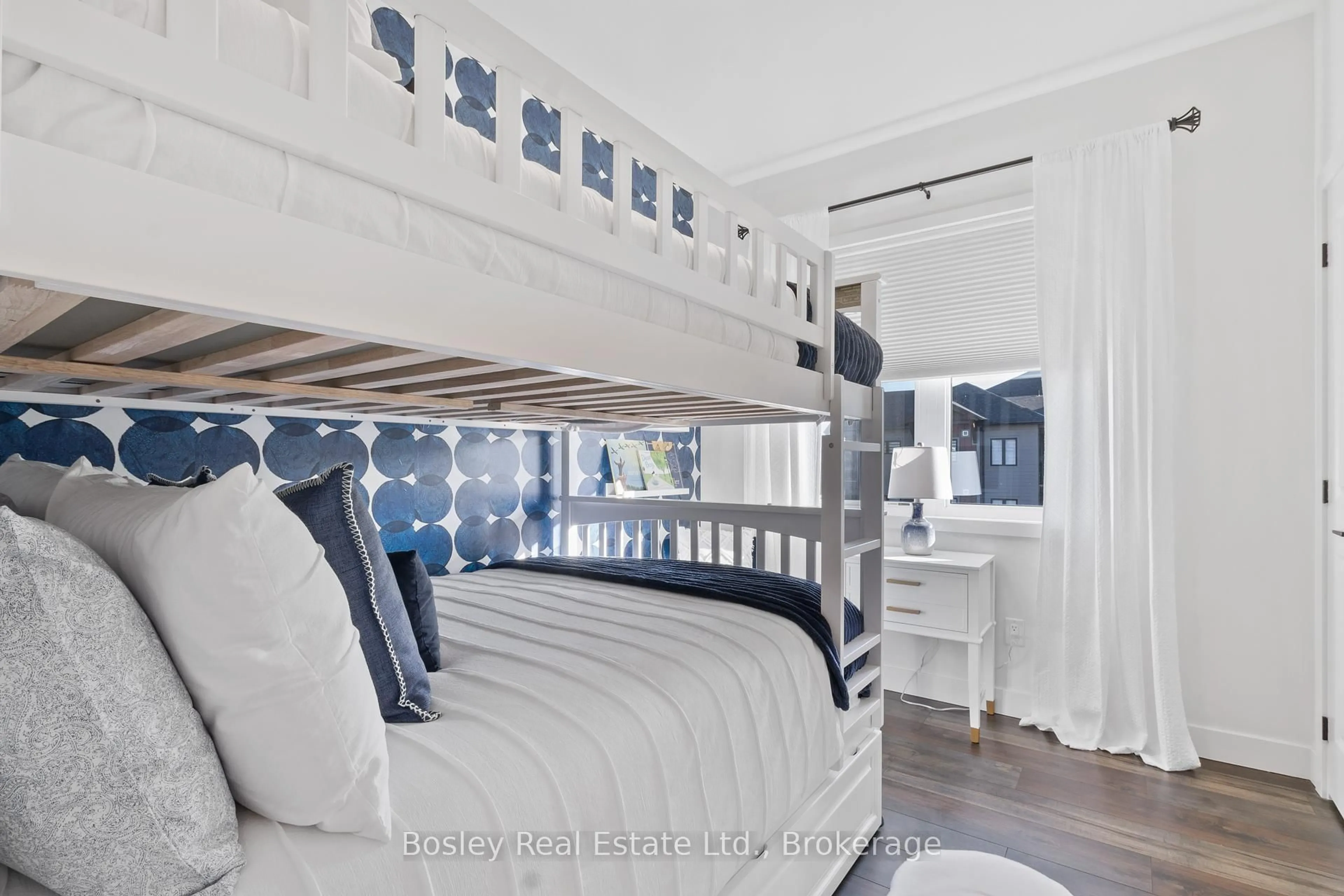 Bedroom with bed, wood/laminate floor for 12 Beckwith Lane #302, Blue Mountains Ontario L9Y 0A4