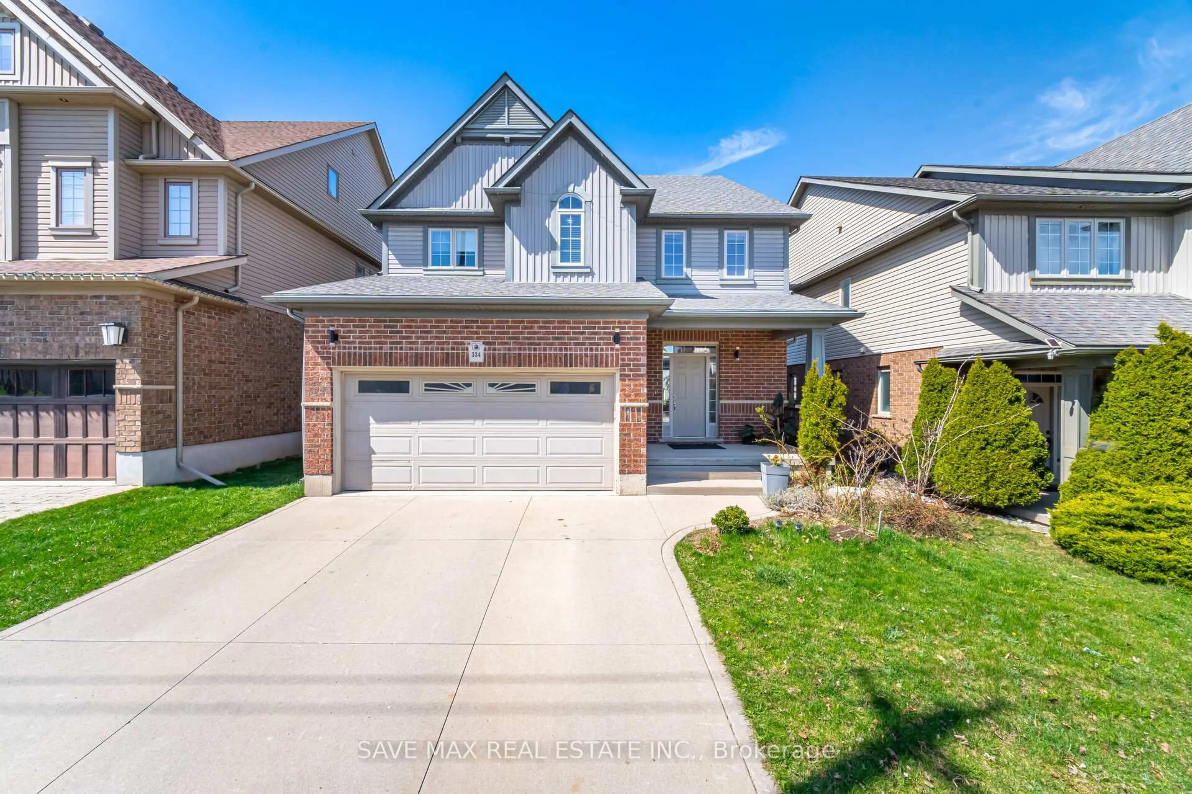 Home with brick exterior material, street for 334 Zeller Dr, Kitchener Ontario N2A 0B5