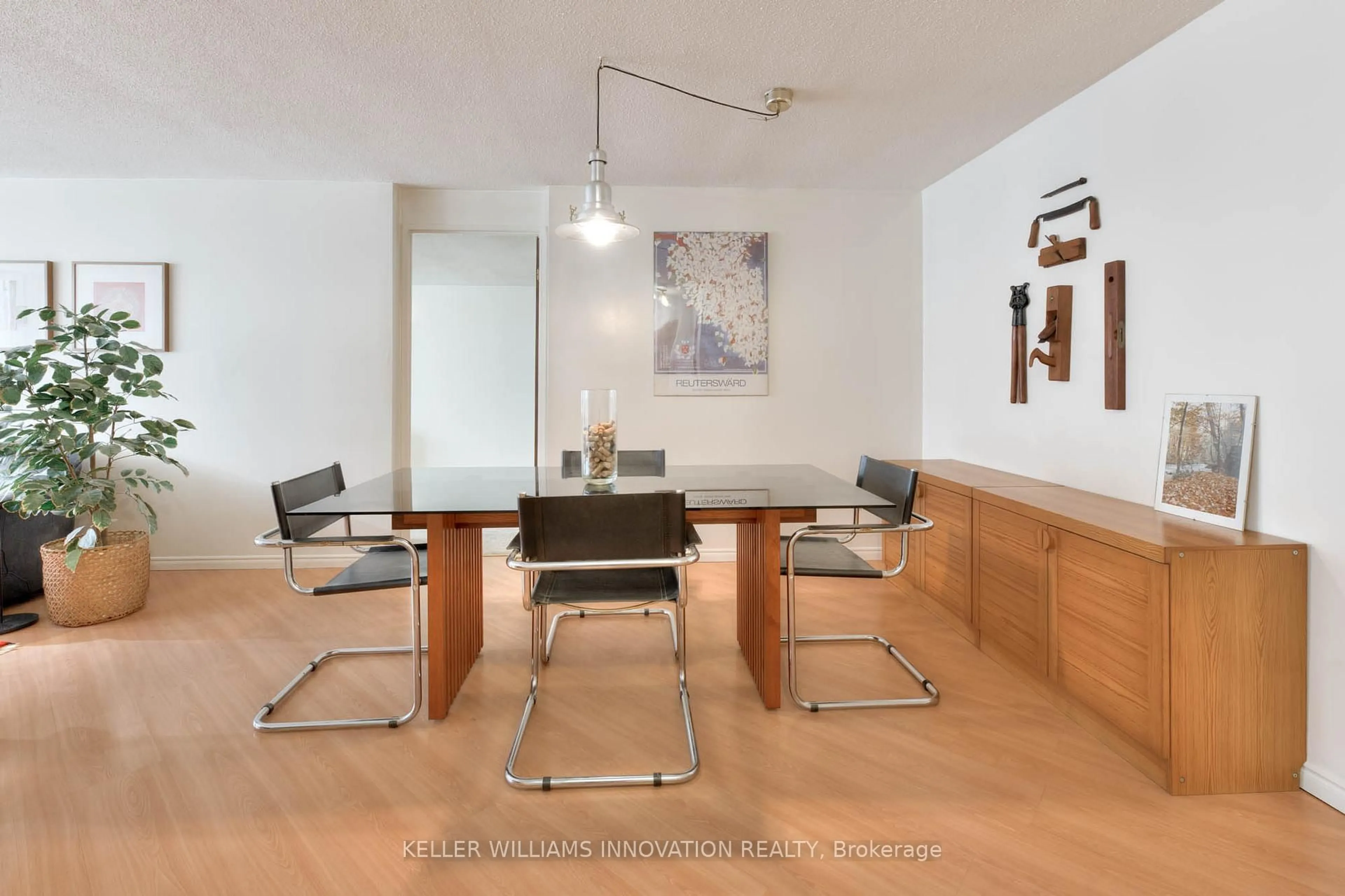 Dining room, wood/laminate floor for 55 Green Valley Dr #215, Kitchener Ontario N2P 1Z6
