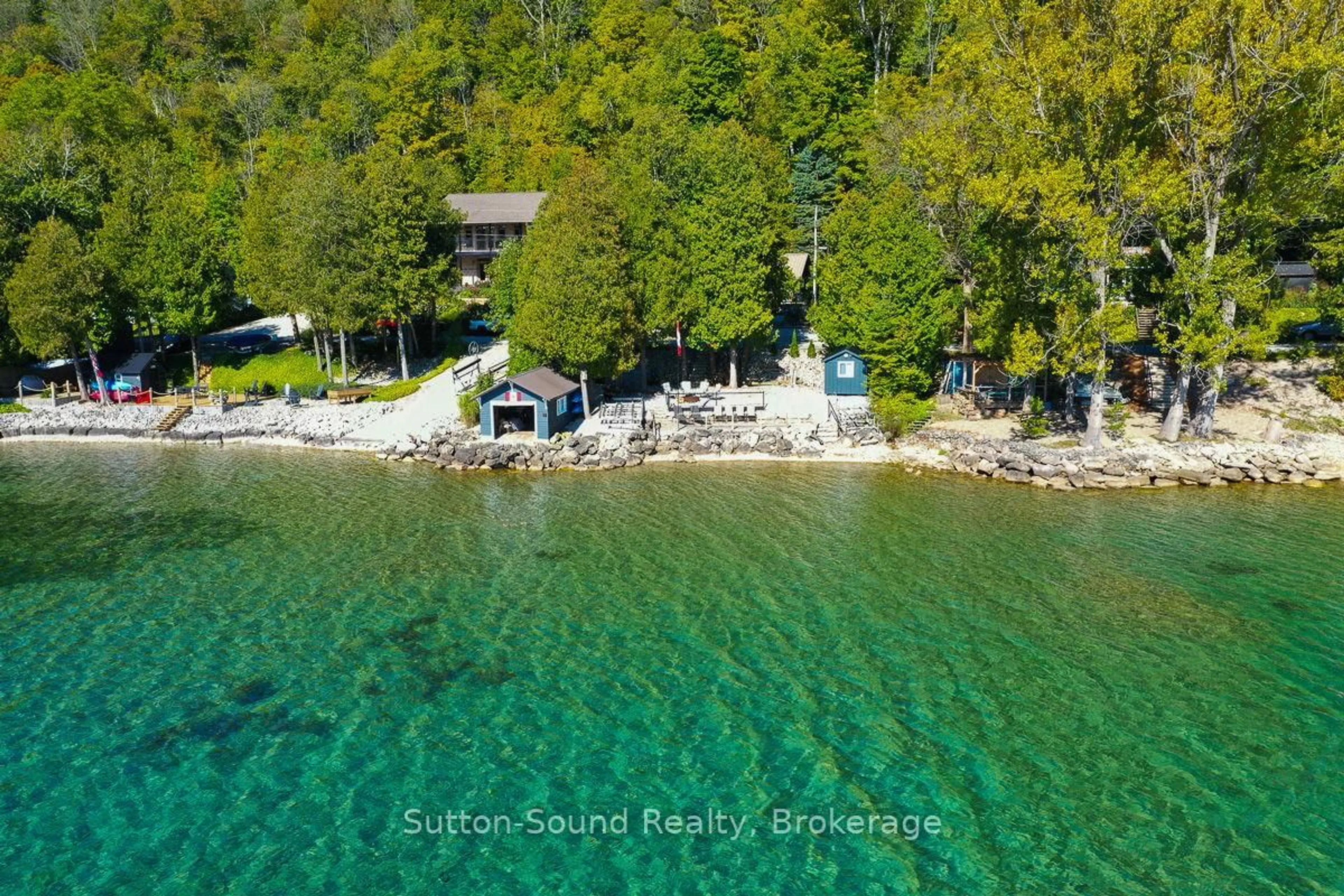 A pic from outside/outdoor area/front of a property/back of a property/a pic from drone, water/lake/river/ocean view for 199 Mallory Beach Rd, South Bruce Peninsula Ontario N0H 2T0