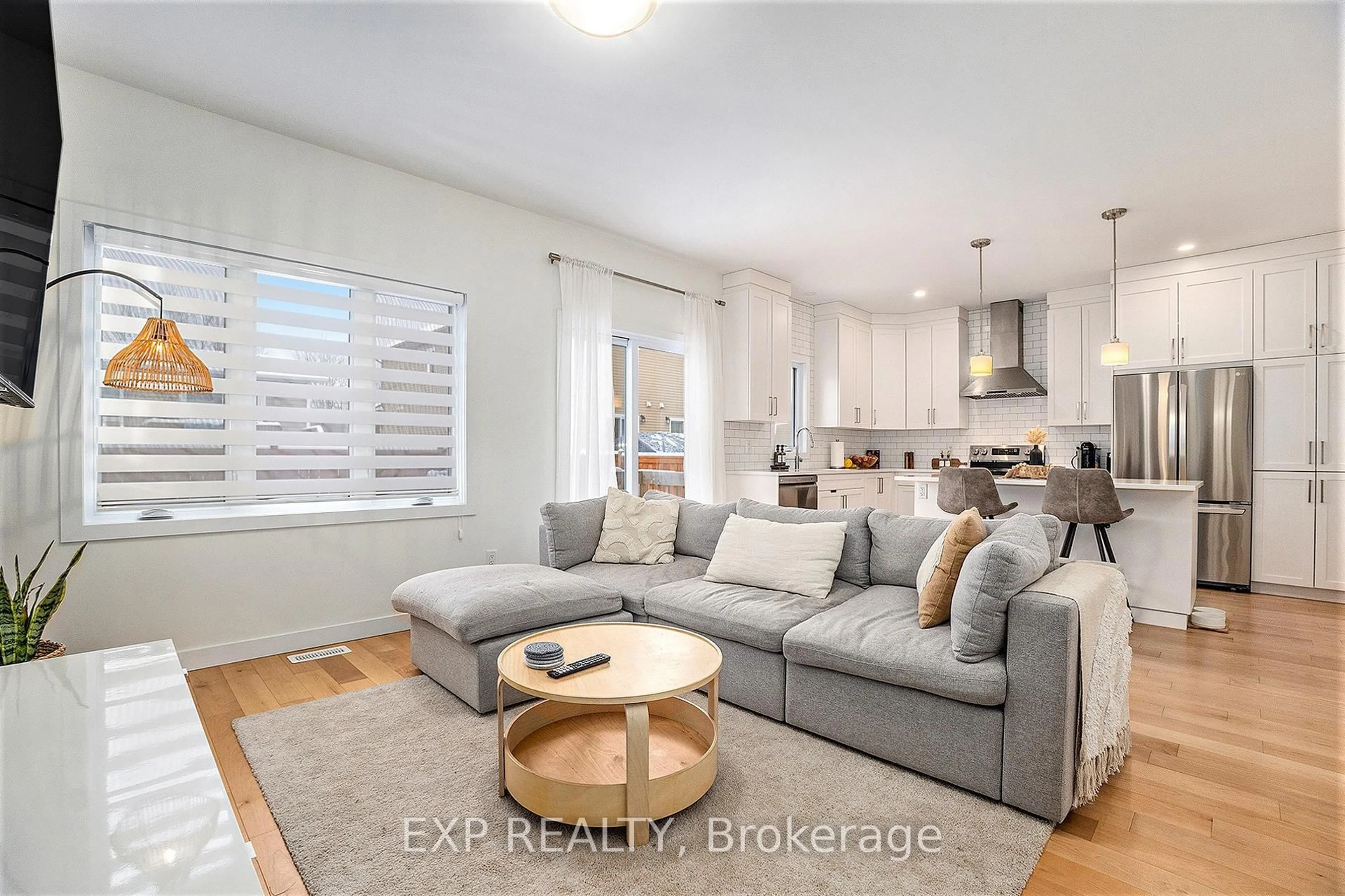 Living room with furniture, wood/laminate floor for 12 LIVYA St, The Nation Ontario K0A 2M0