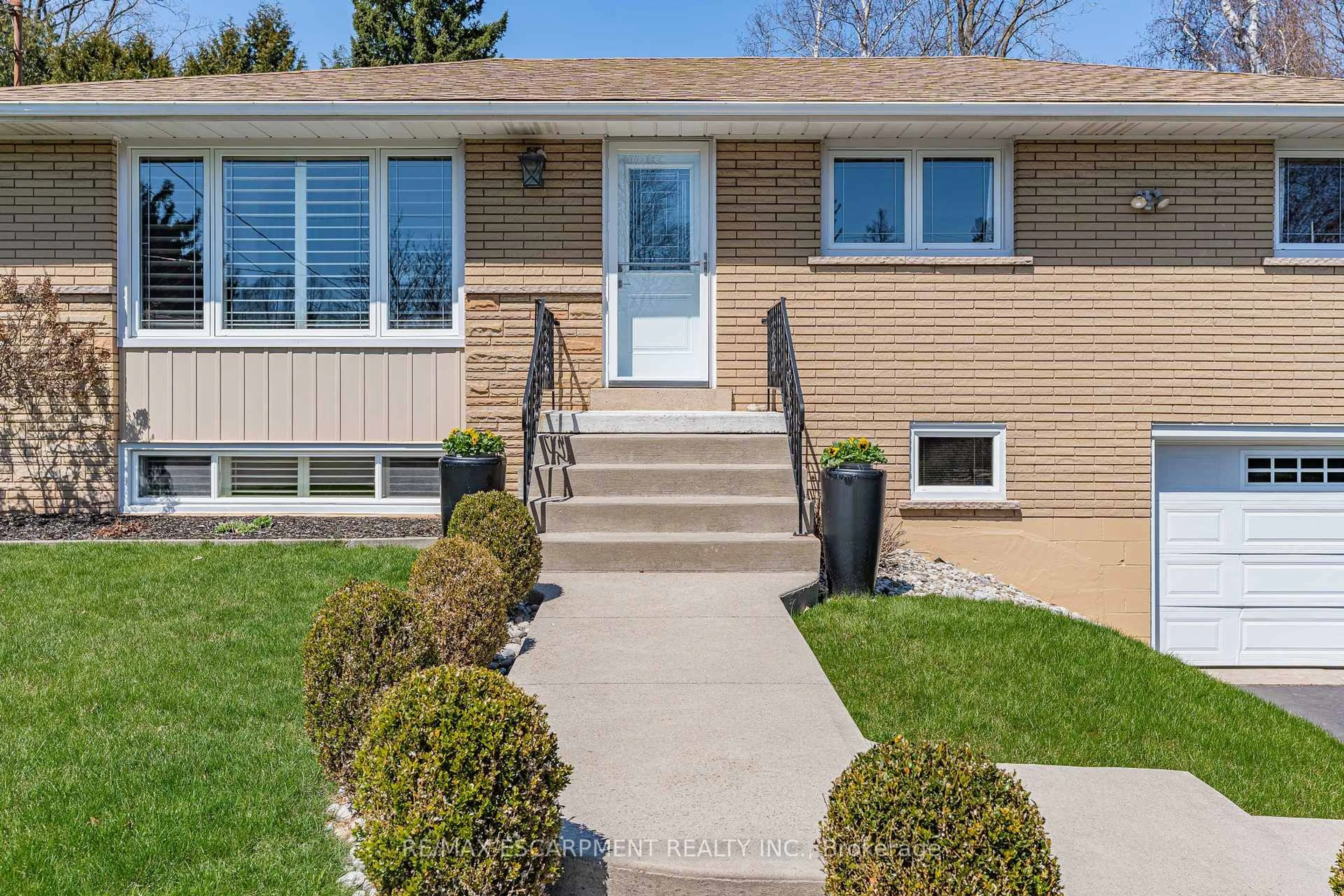 Home with brick exterior material, street for 77 Hill Crest N/A, Hamilton Ontario L9G 3A2