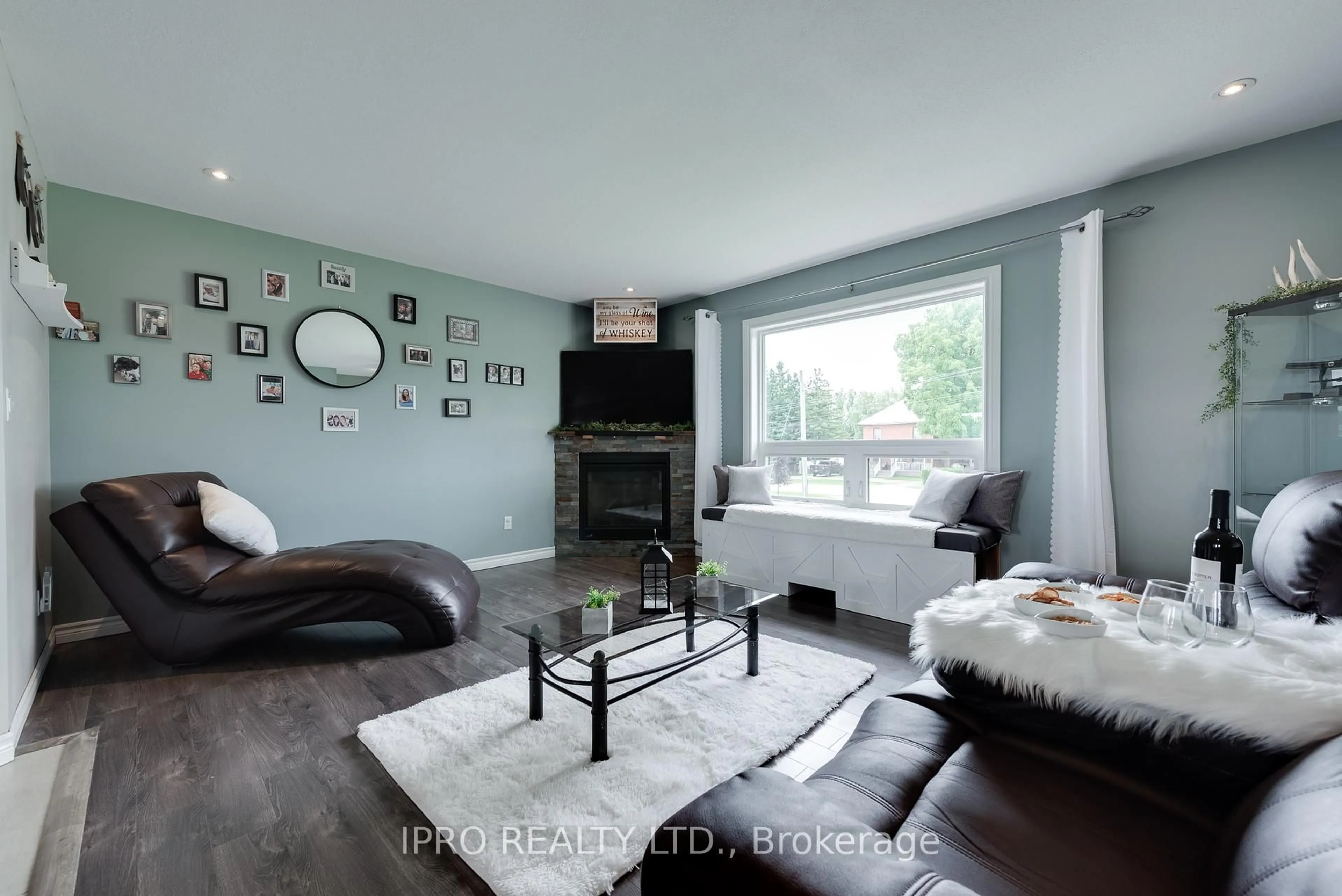 Living room with furniture, wood/laminate floor for 8961 Wellington Road 16 N/A, Wellington North Ontario N0G 2E0