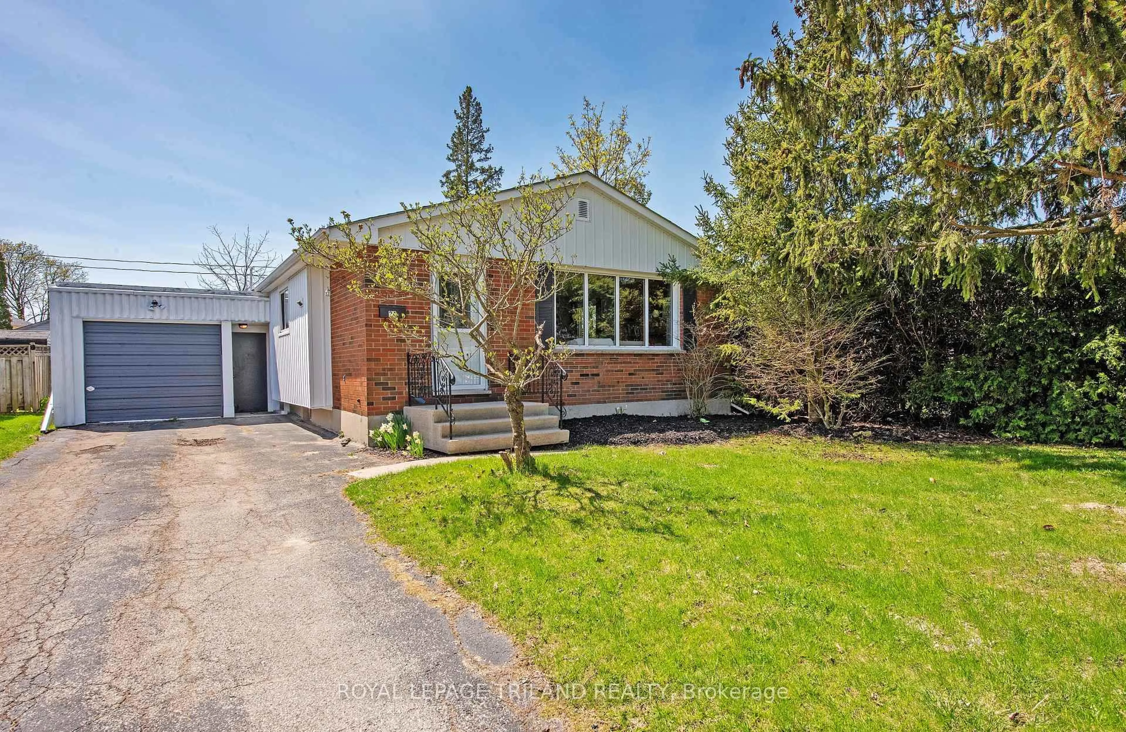 Home with brick exterior material, street for 24 Dunwich Dr, St. Thomas Ontario N5R 4T9