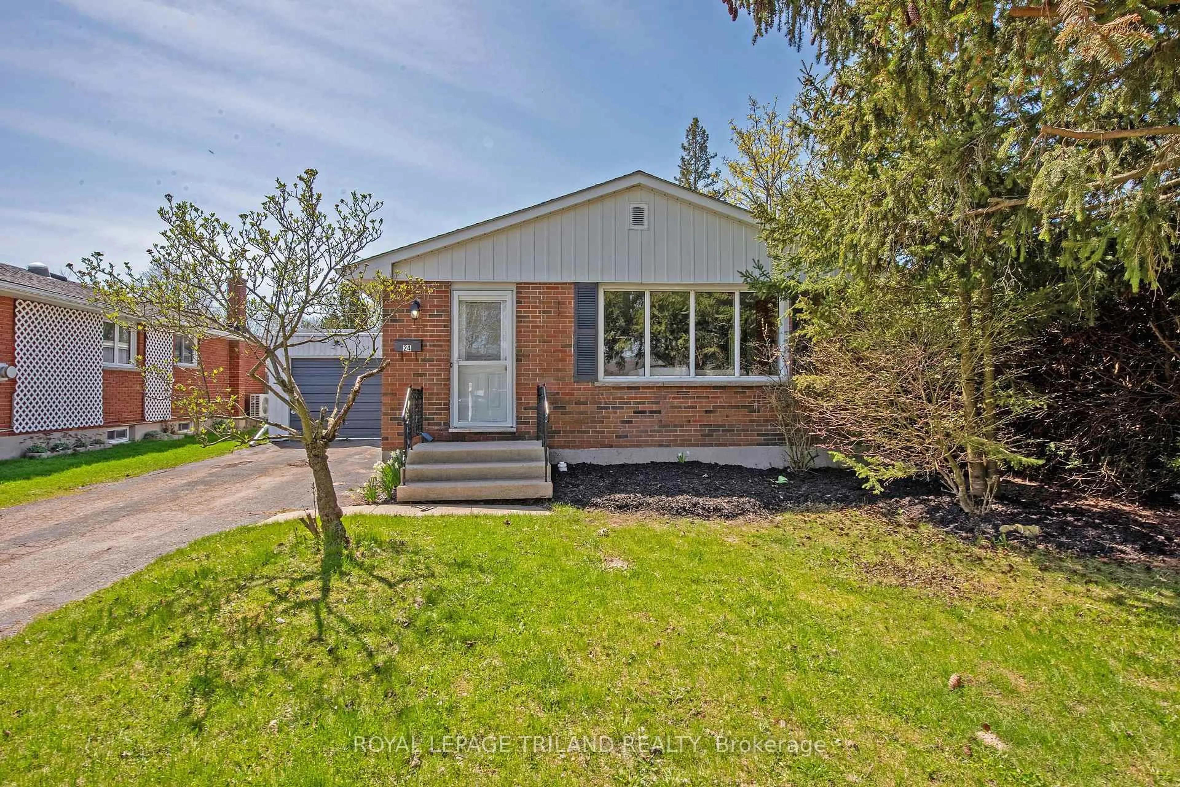 Home with brick exterior material, street for 24 Dunwich Dr, St. Thomas Ontario N5R 4T9