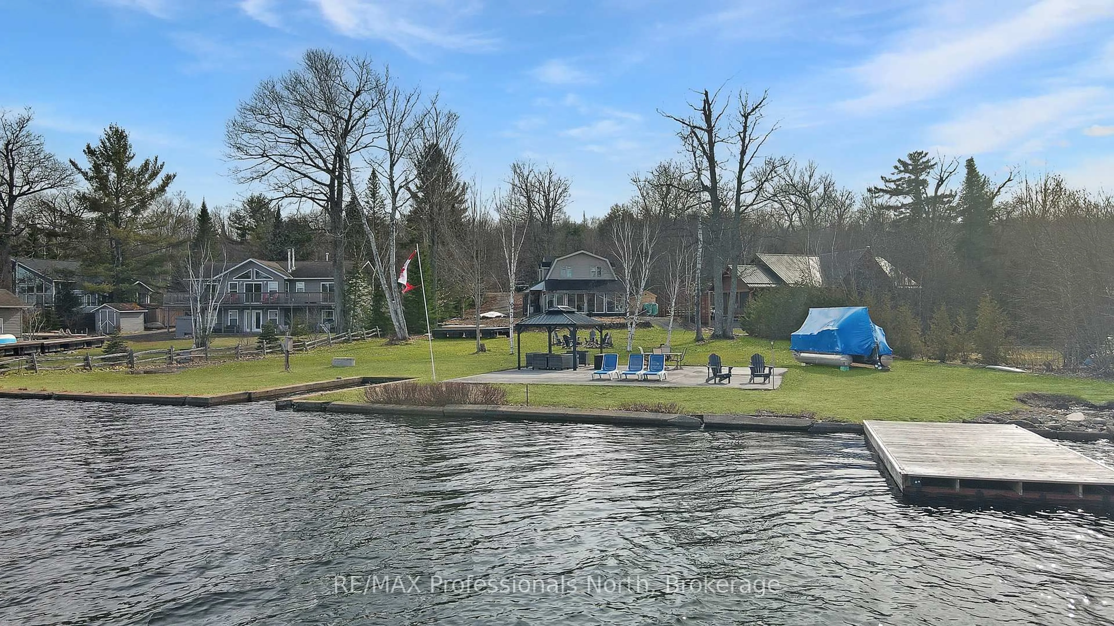 A pic from outside/outdoor area/front of a property/back of a property/a pic from drone, water/lake/river/ocean view for 1008 Cherokee Tr, Algonquin Highlands Ontario P1H 0K1