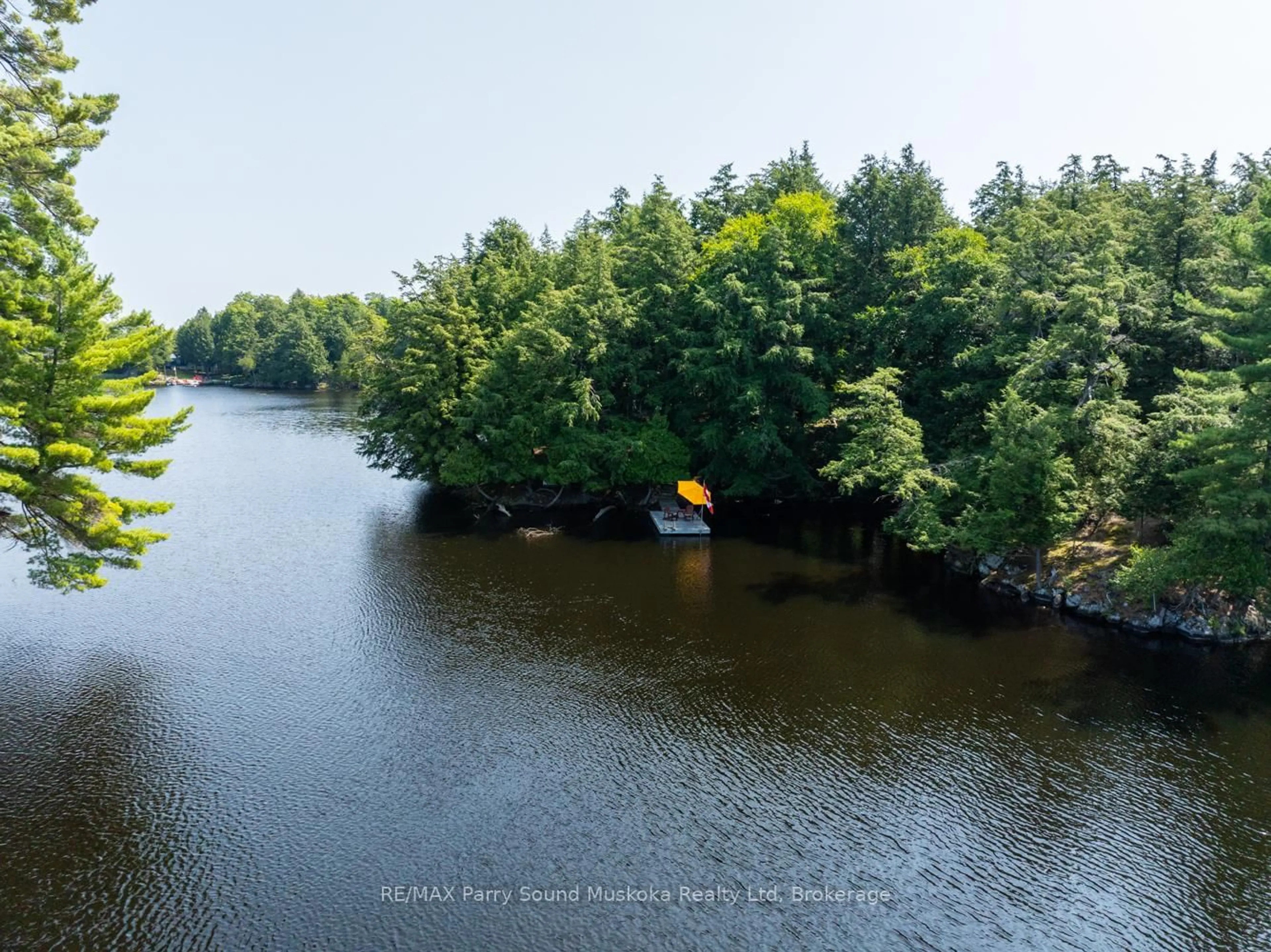 A pic from outside/outdoor area/front of a property/back of a property/a pic from drone, water/lake/river/ocean view for 18 MEHARG Dr, McKellar Ontario P2A 0B5