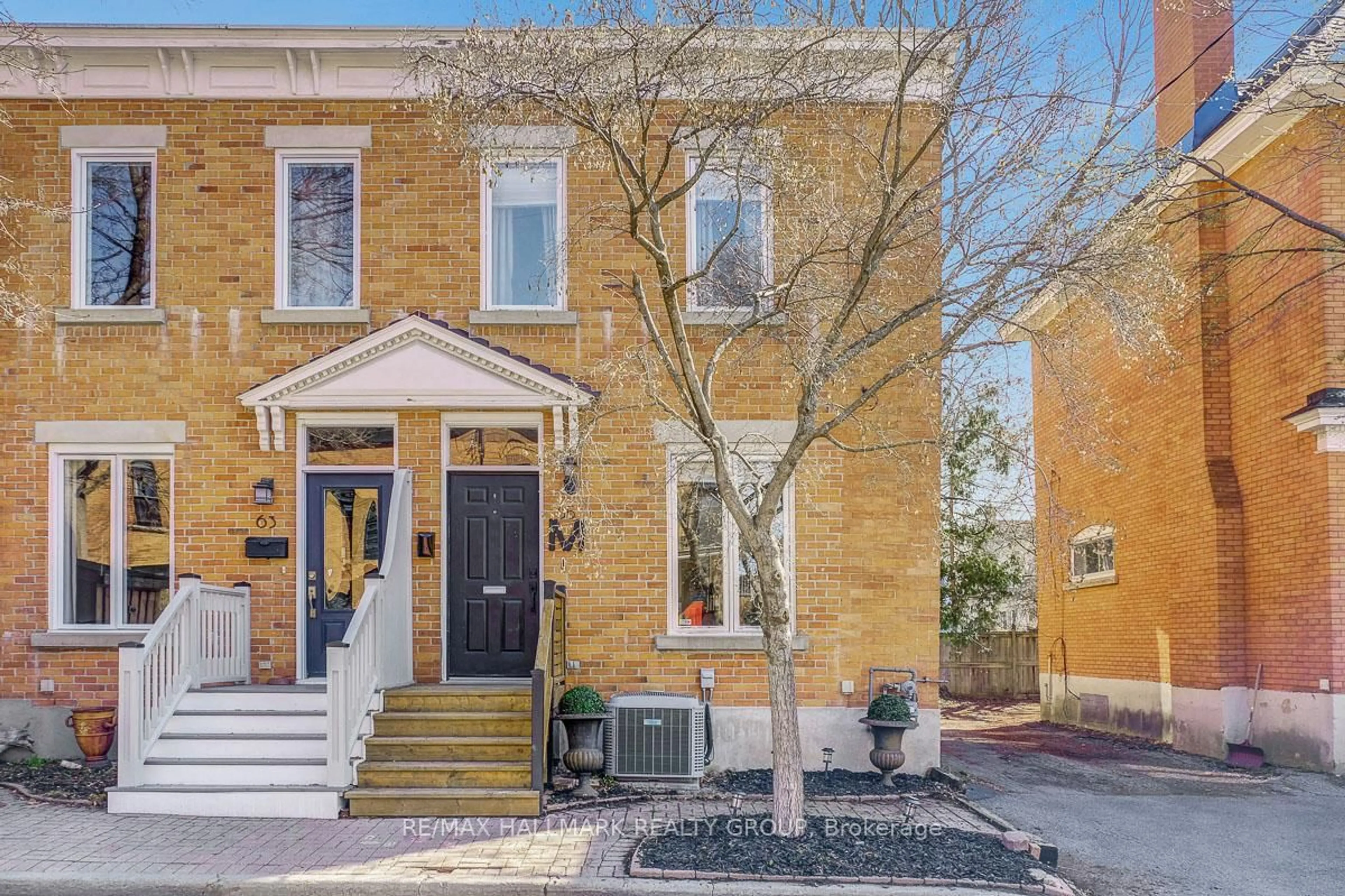 Home with brick exterior material, street for 65 Macdonald St, Ottawa Ontario K2P 1H5