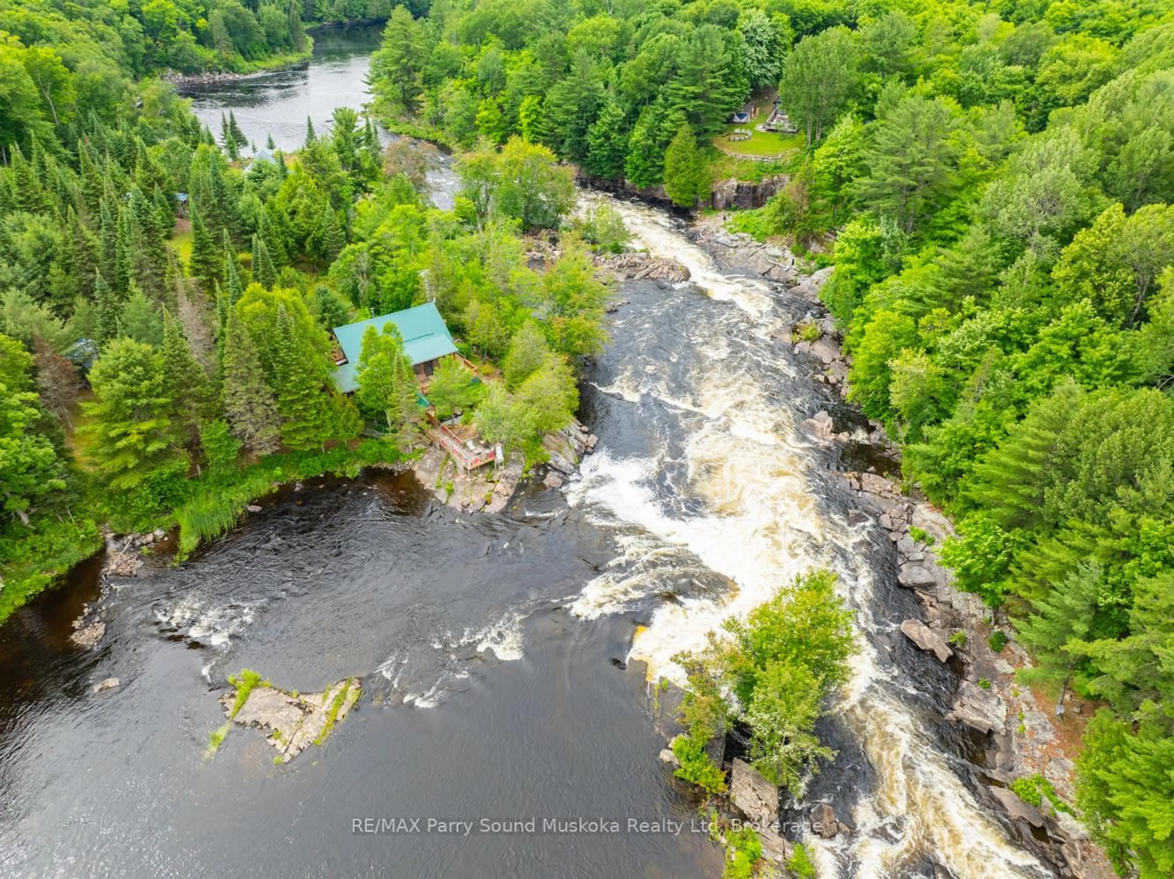 A pic from outside/outdoor area/front of a property/back of a property/a pic from drone, water/lake/river/ocean view for 16 B MAGNET Rd, Magnetawan Ontario P0A 1P0