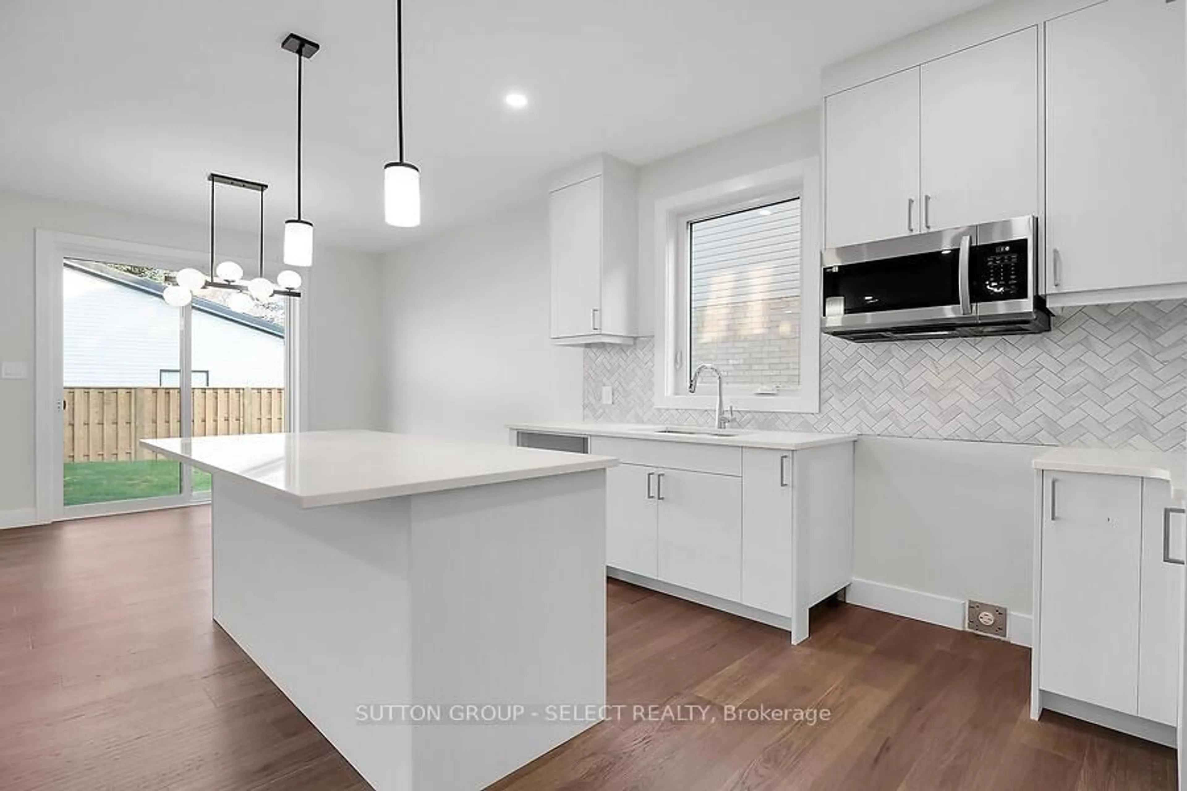 Open concept kitchen, ceramic/tile floor for 7966 Fallon Dr #17, Lucan Biddulph Ontario N0M 1V0