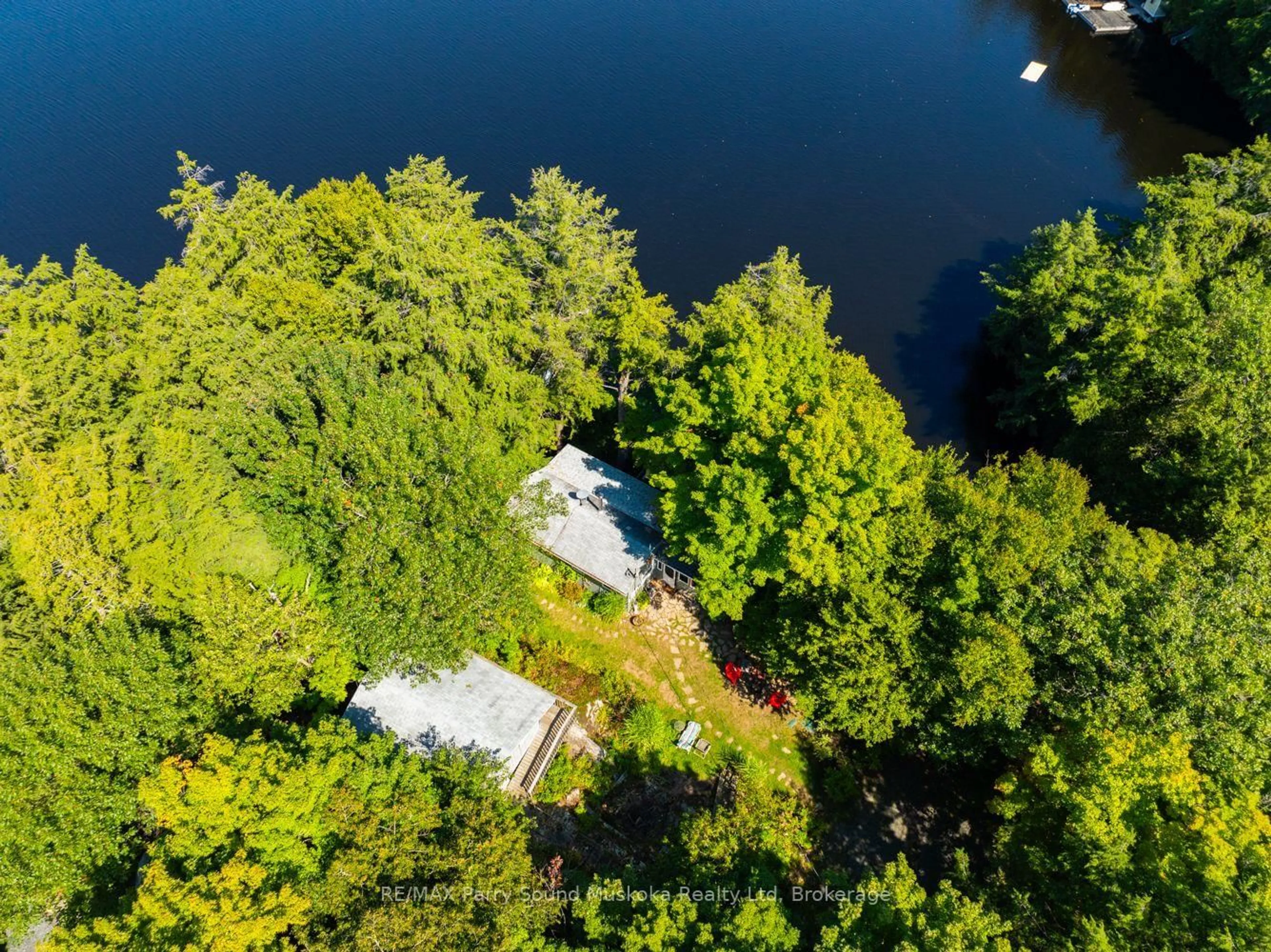 A pic from outside/outdoor area/front of a property/back of a property/a pic from drone, water/lake/river/ocean view for 58 DEERFIELD Rd, McKellar Ontario P2A 0B4